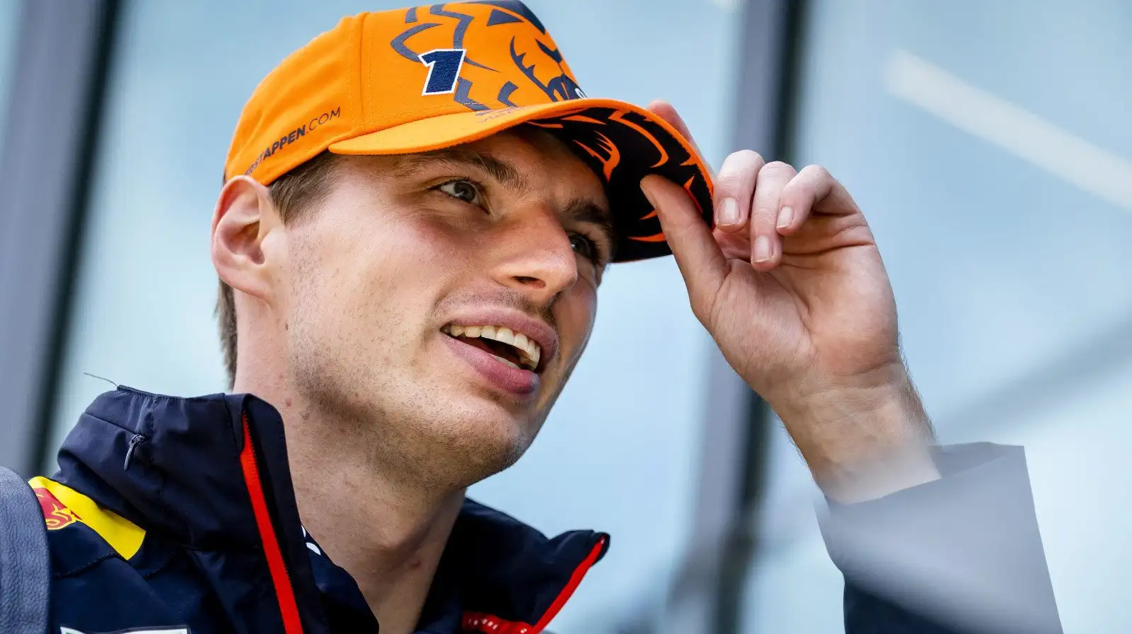 Max Verstappen doffs cap. Britain July 2023