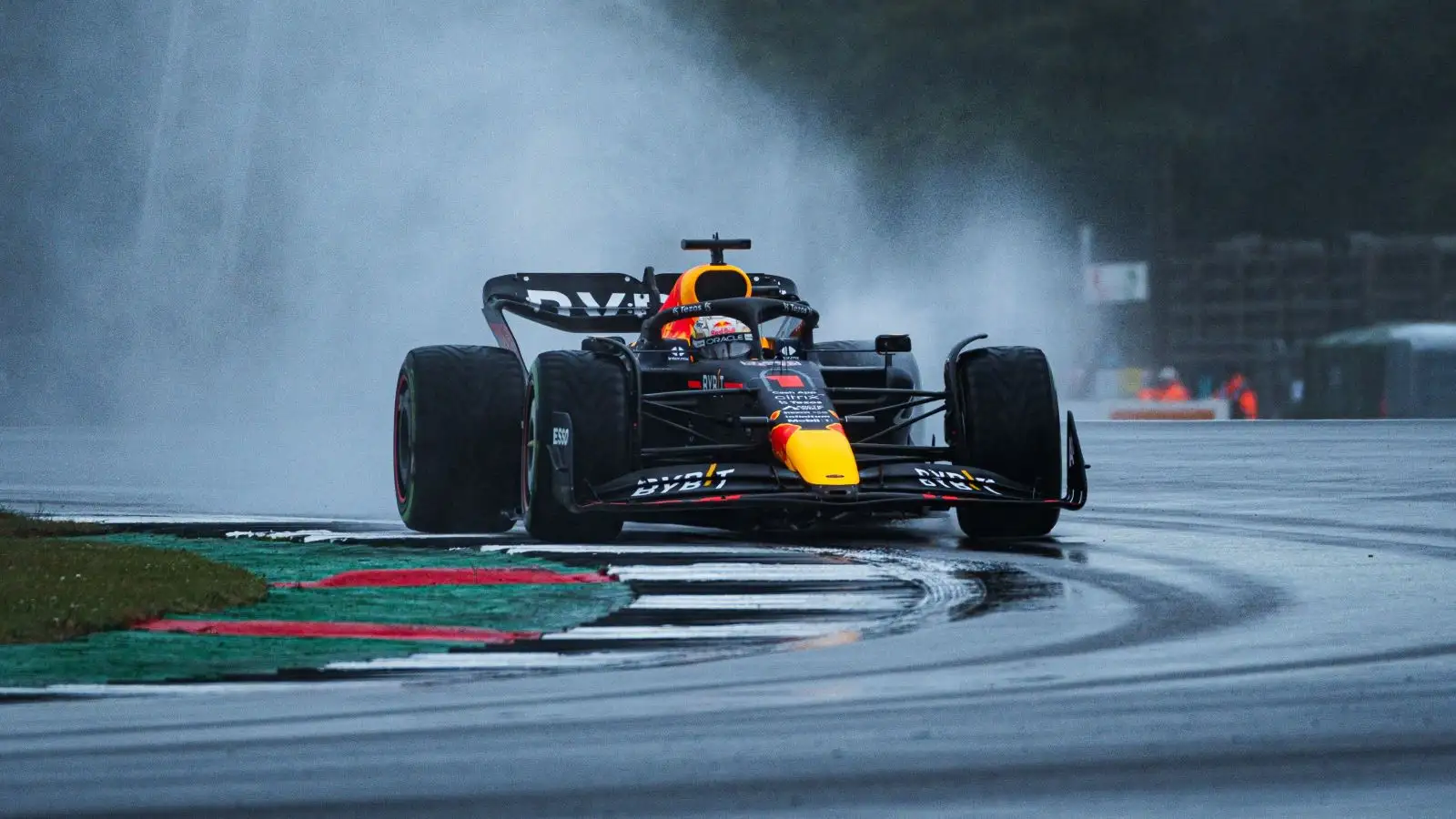 Max Verstappen (Red Bull) round a corner in the wet in final practice at the British Grand Prix. Silverstone, July 2023.