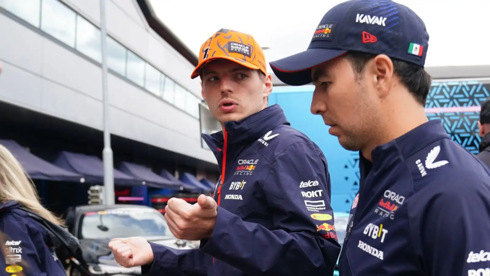 Max Verstappen in serious conversation with Sergio Perez. Britain July 2023