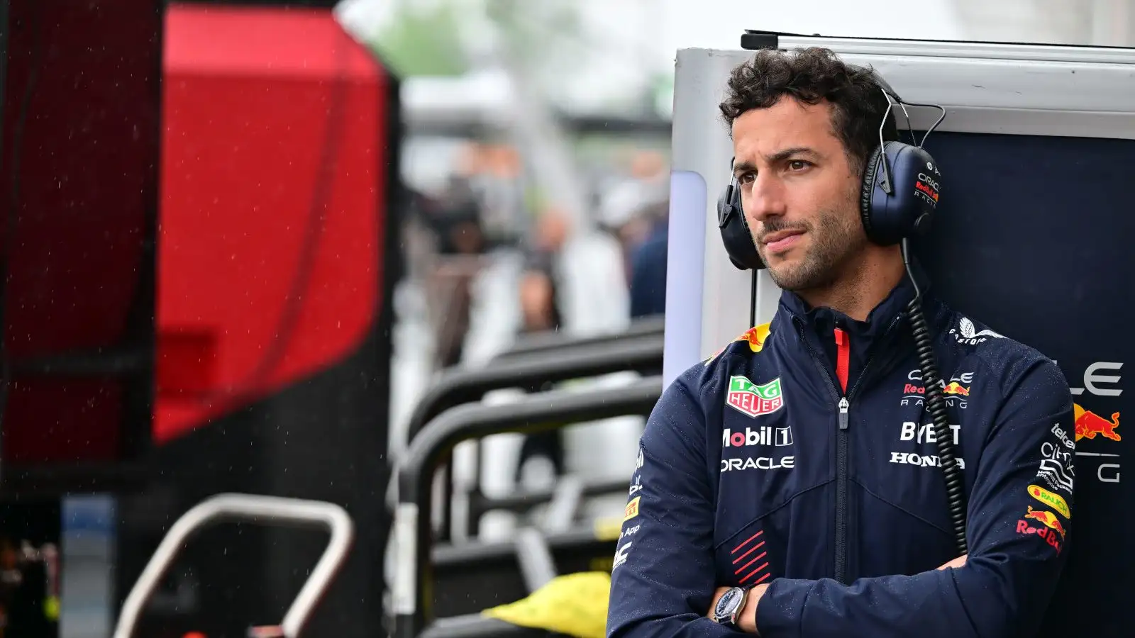 Daniel Ricciardo pensive with arms crossed. Britain July 2023
