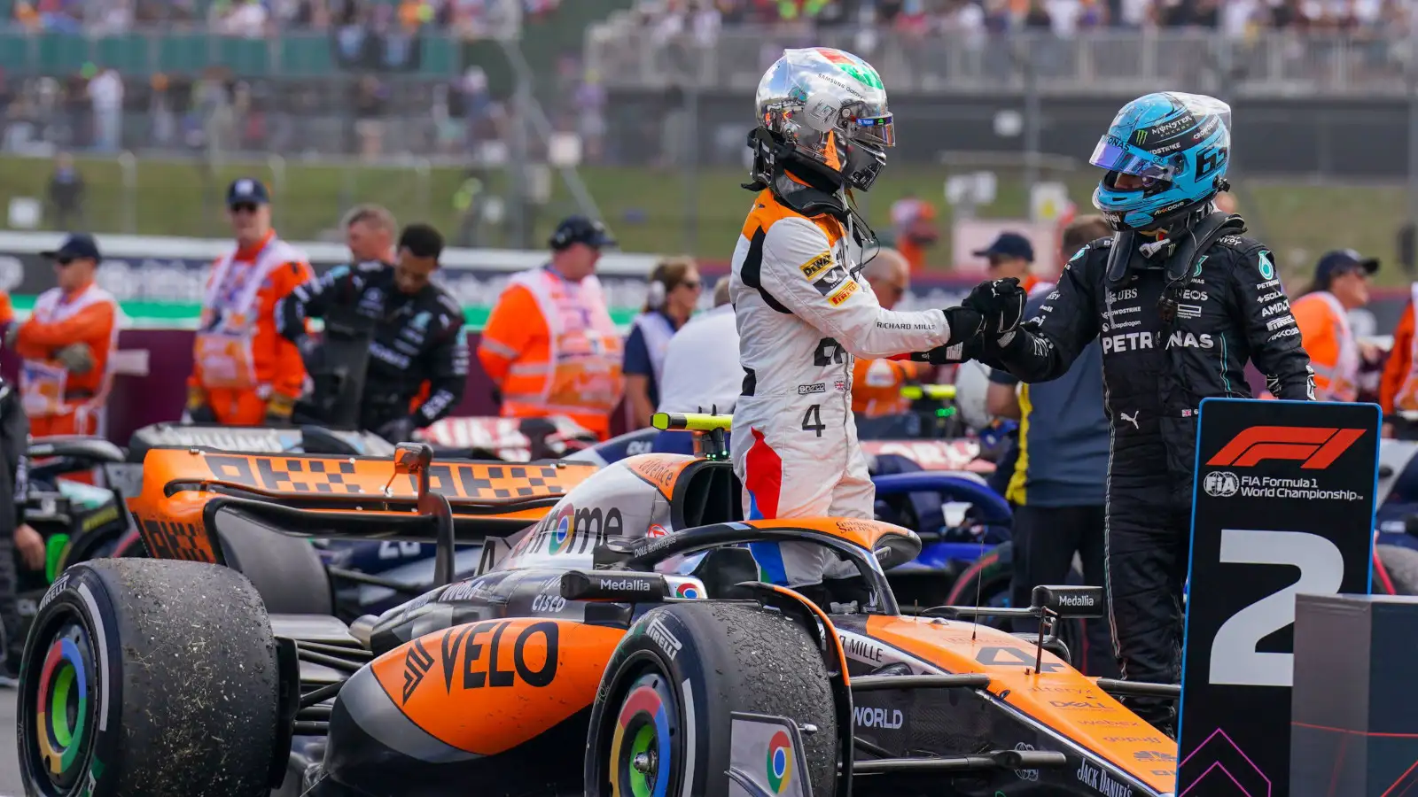 George Russell congratulates Lando Norris on his P2. Britain July 2023