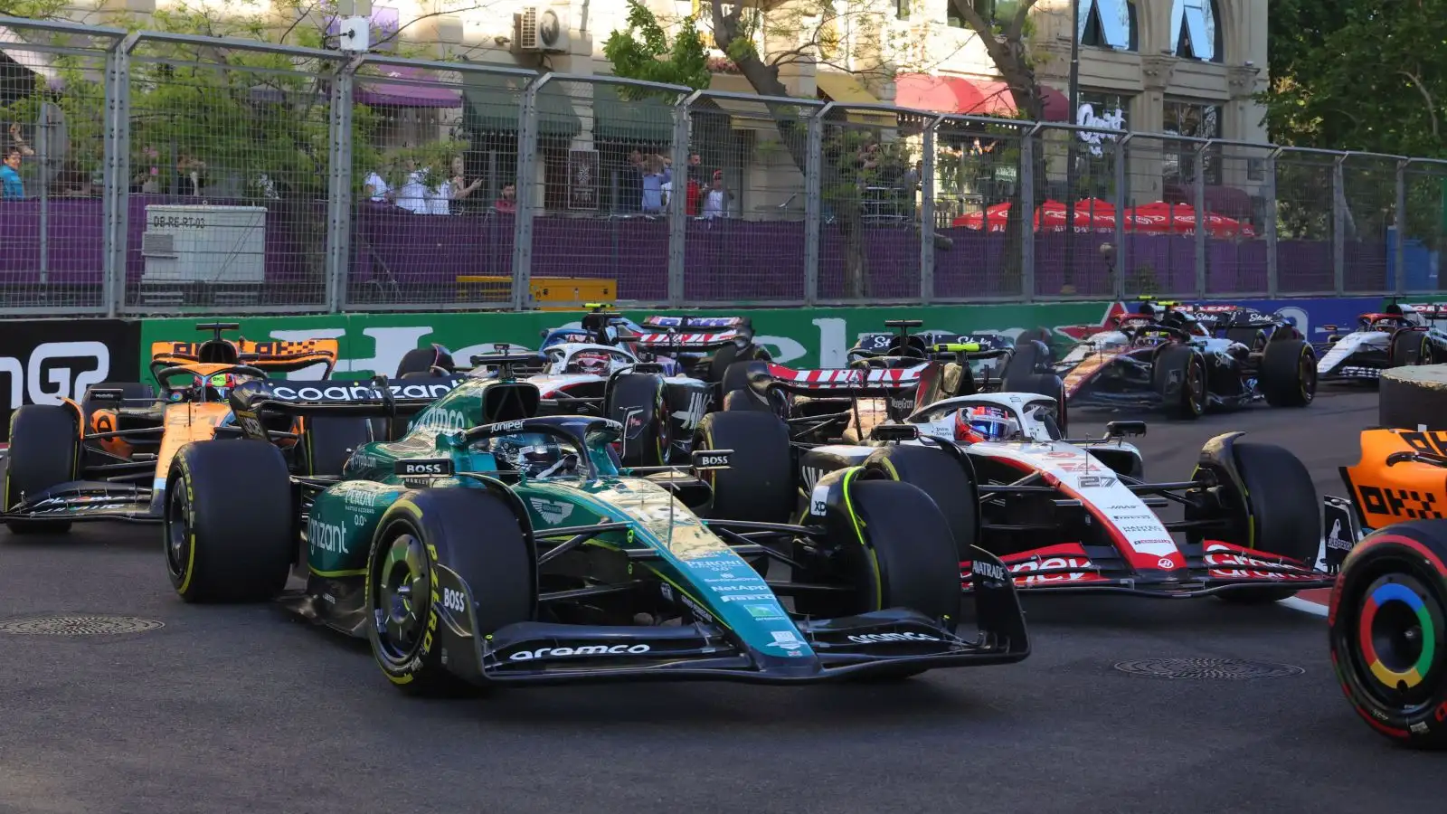 Lance Stroll (Aston Martin) and Nico Hulkenberg (Haas) race closely at the start of the Azerbaijan Grand Prix sprint race. Baku, April 2023.