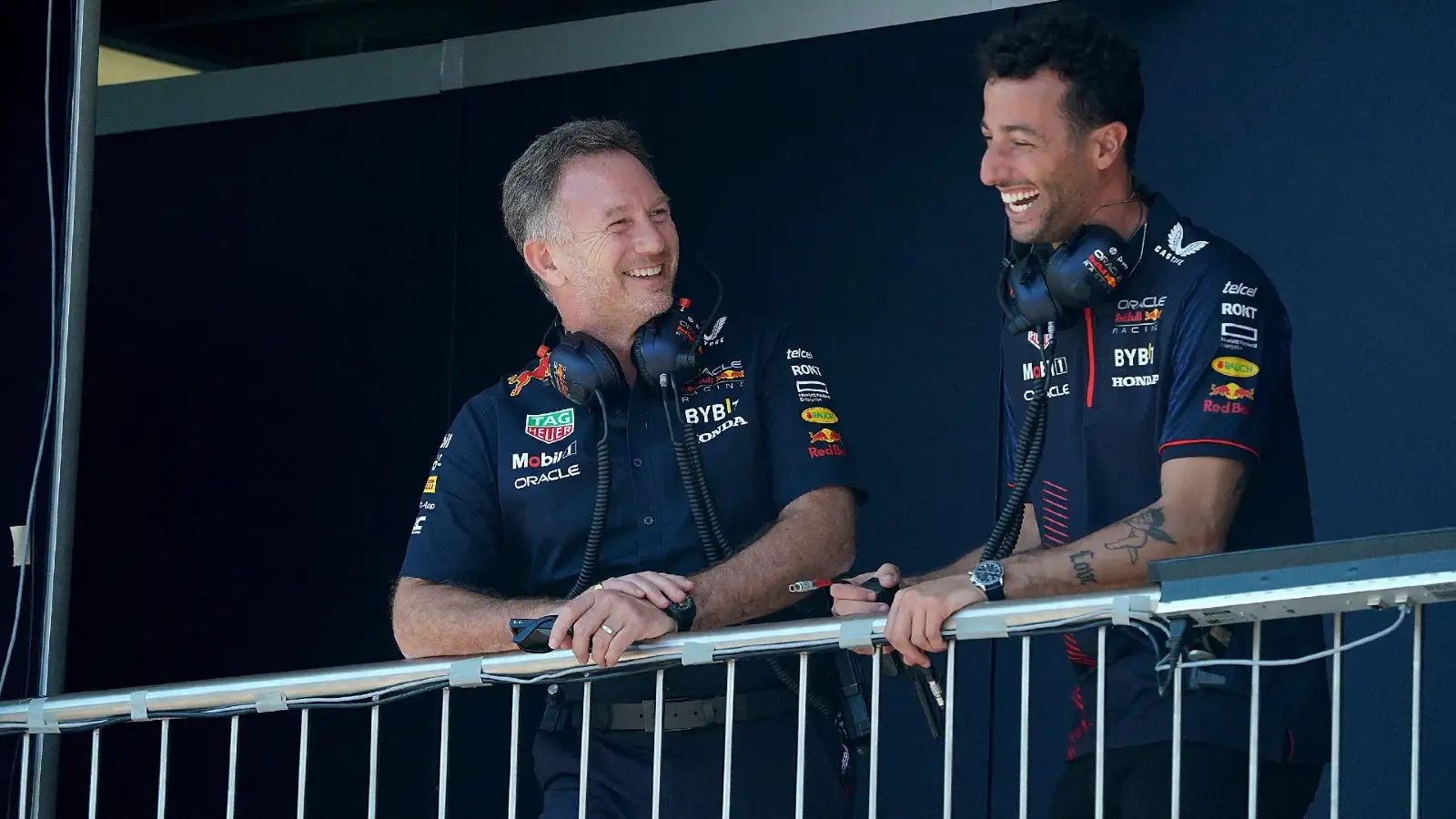 Red Bull's Christian Horner and Daniel Ricciardo. July 2023.