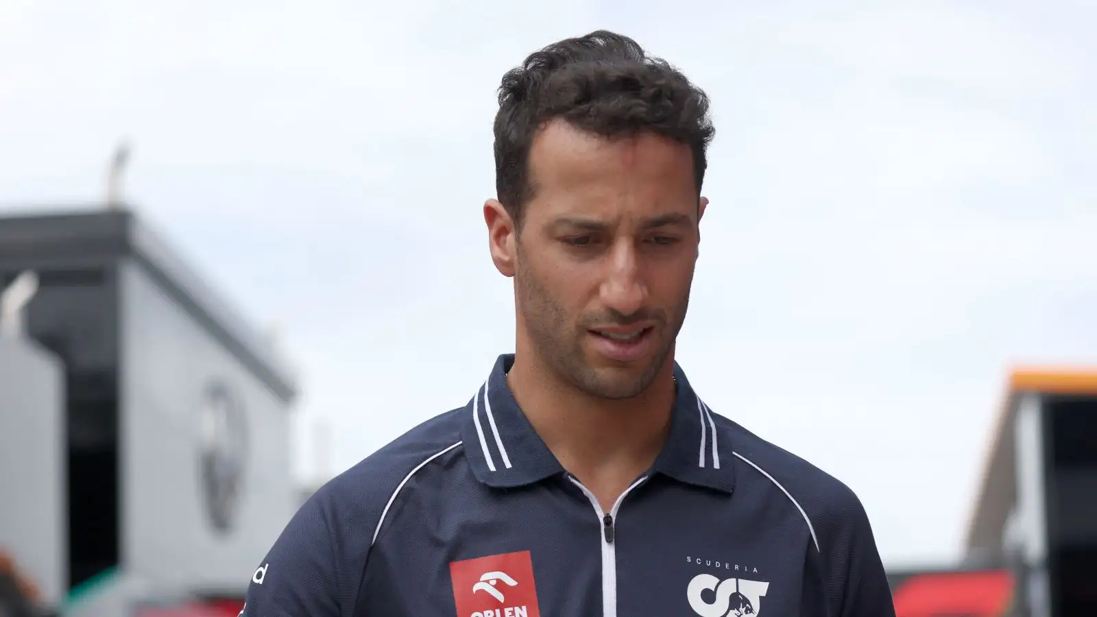 AlphaTauri driver Daniel Ricciardo in thought.