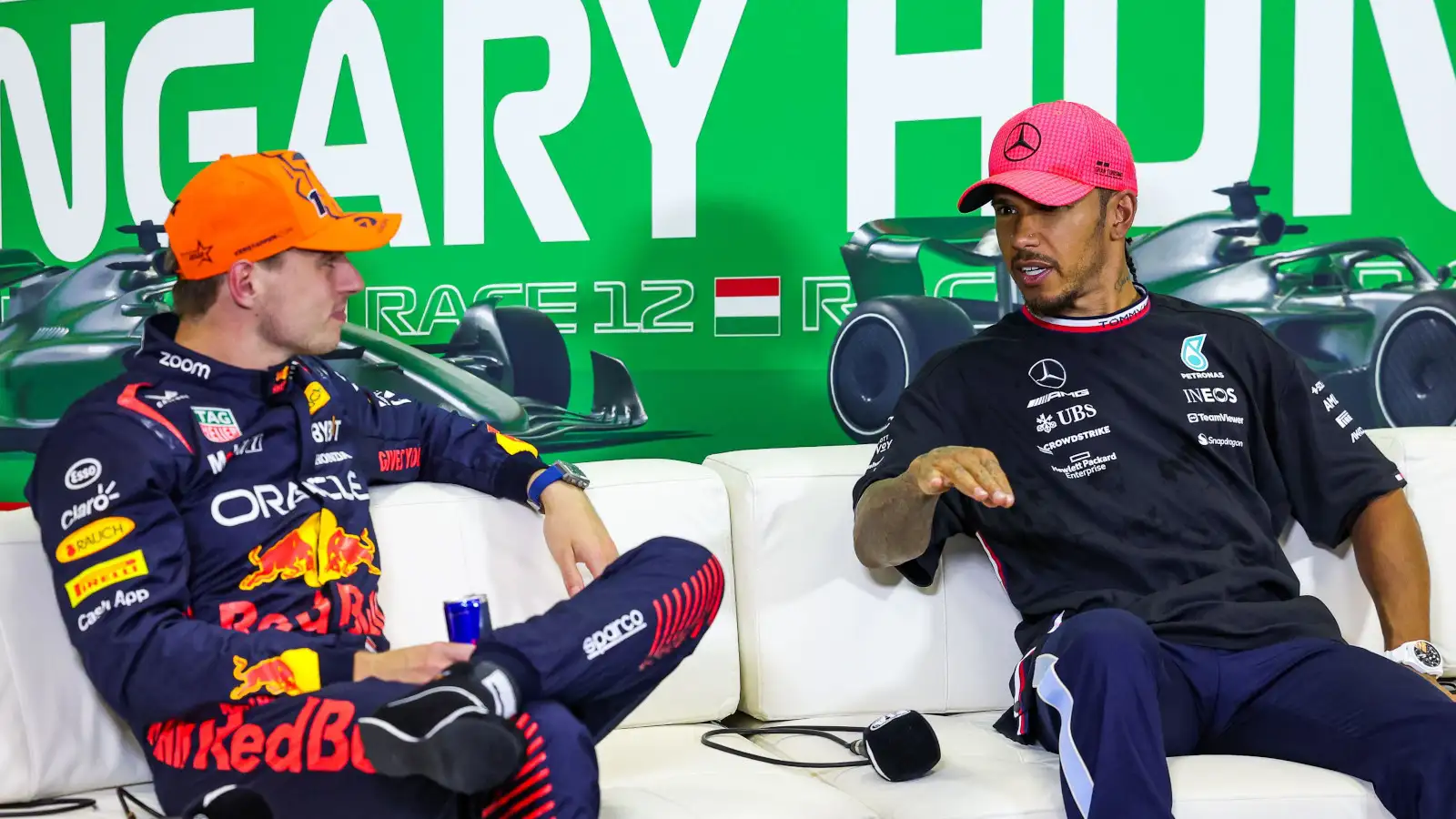 Lewis Hamilton explaining to Max Verstappen in the press conference. Hungary July 2023