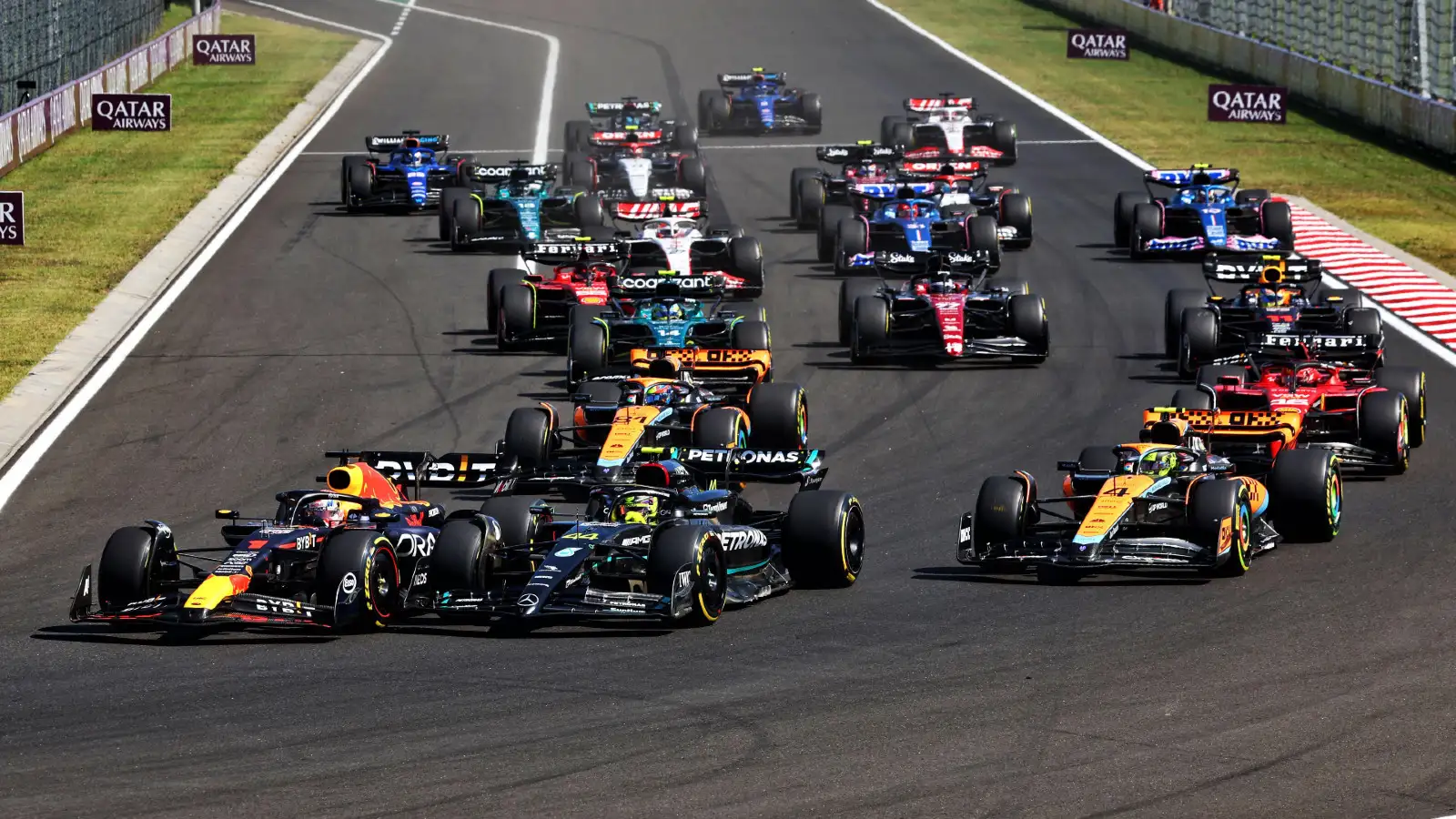 Red Bull's Max Verstappen takes the lead at the start of the Hungarian Grand Prix. Budapest, July 2023.