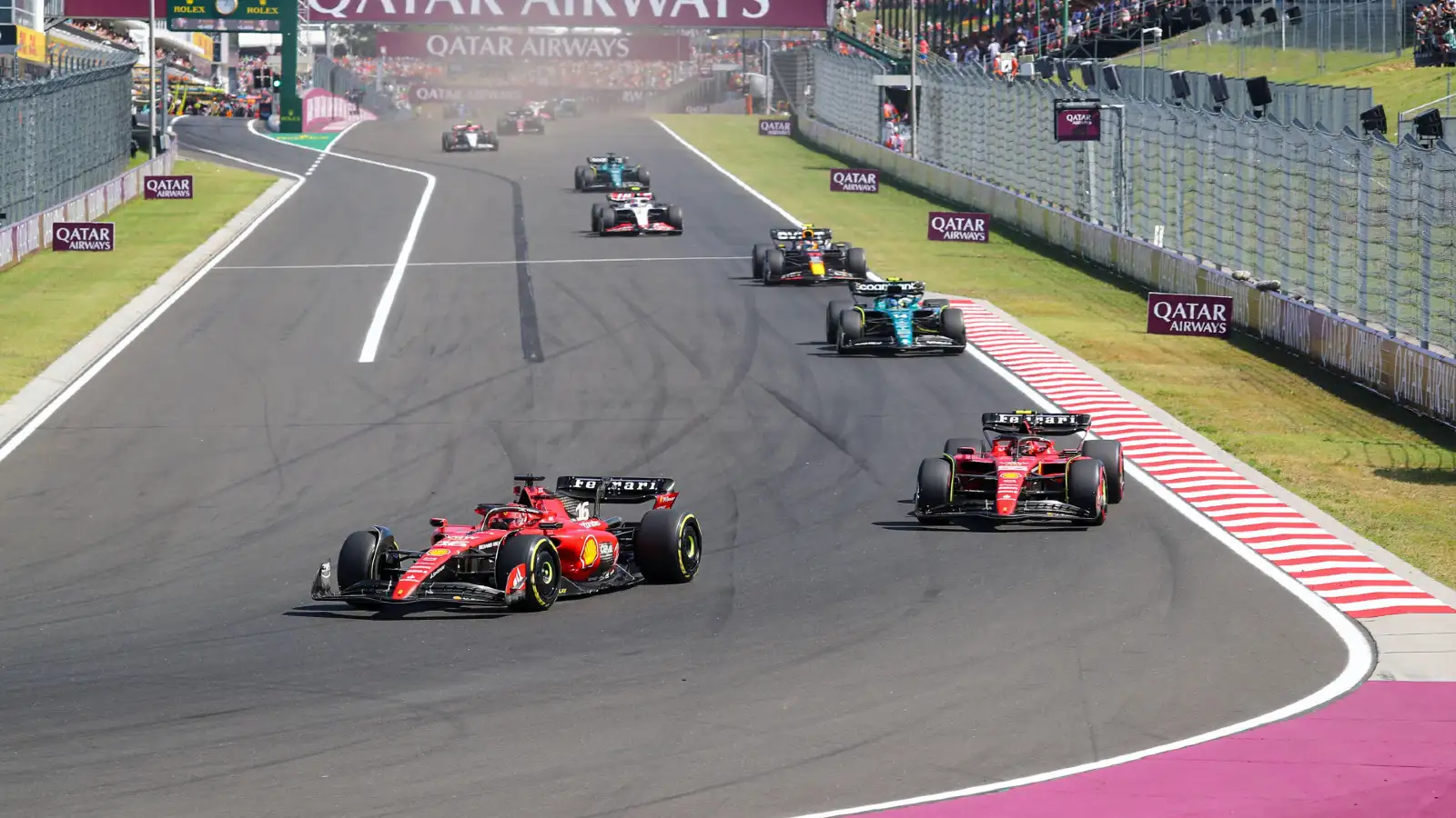 Ferrari's Charles Leclerc and Carlos Sainz at the Hungarian Grand Prix. Budapest, July 2023.