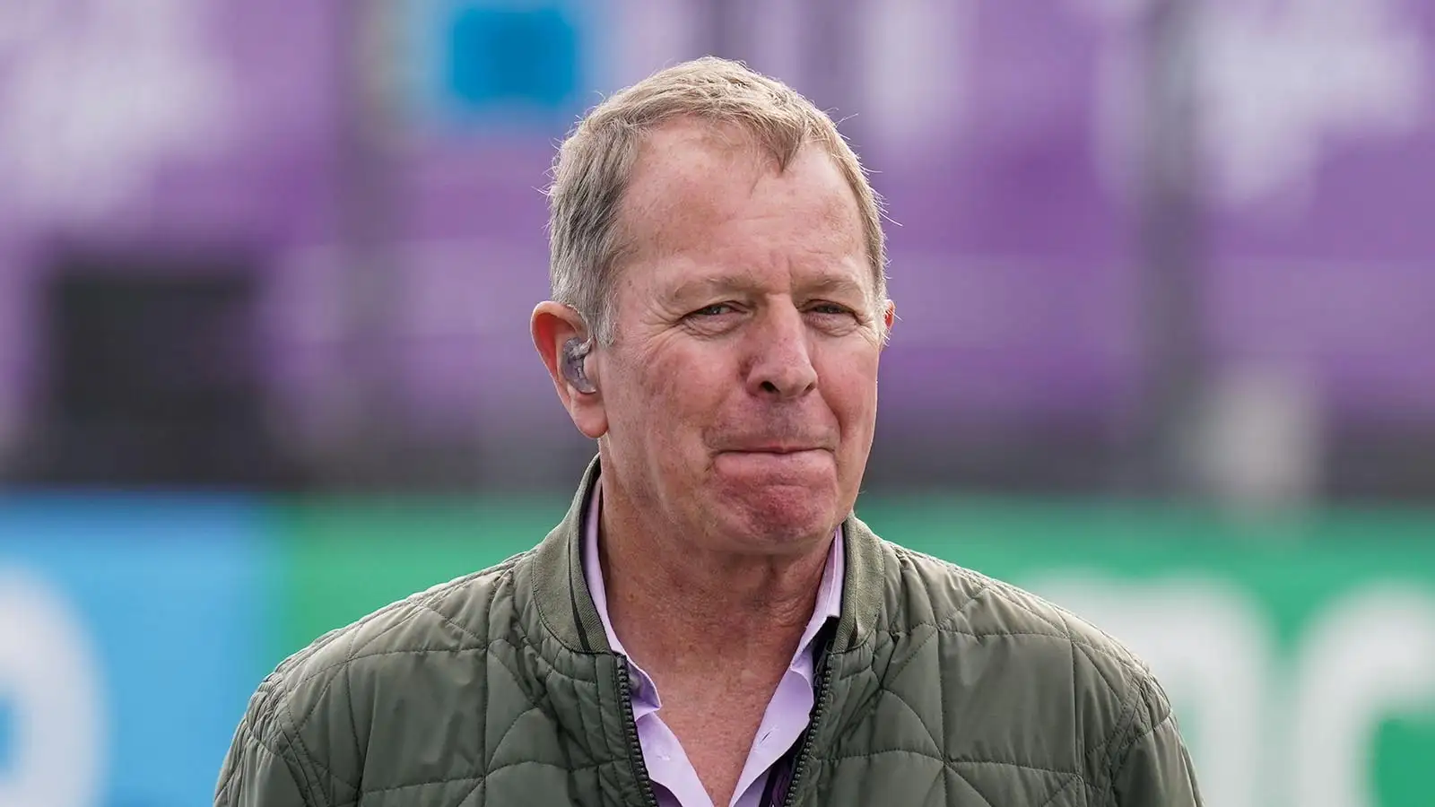 Martin Brundle looks on as he prepares to broadcast live from Silverstone