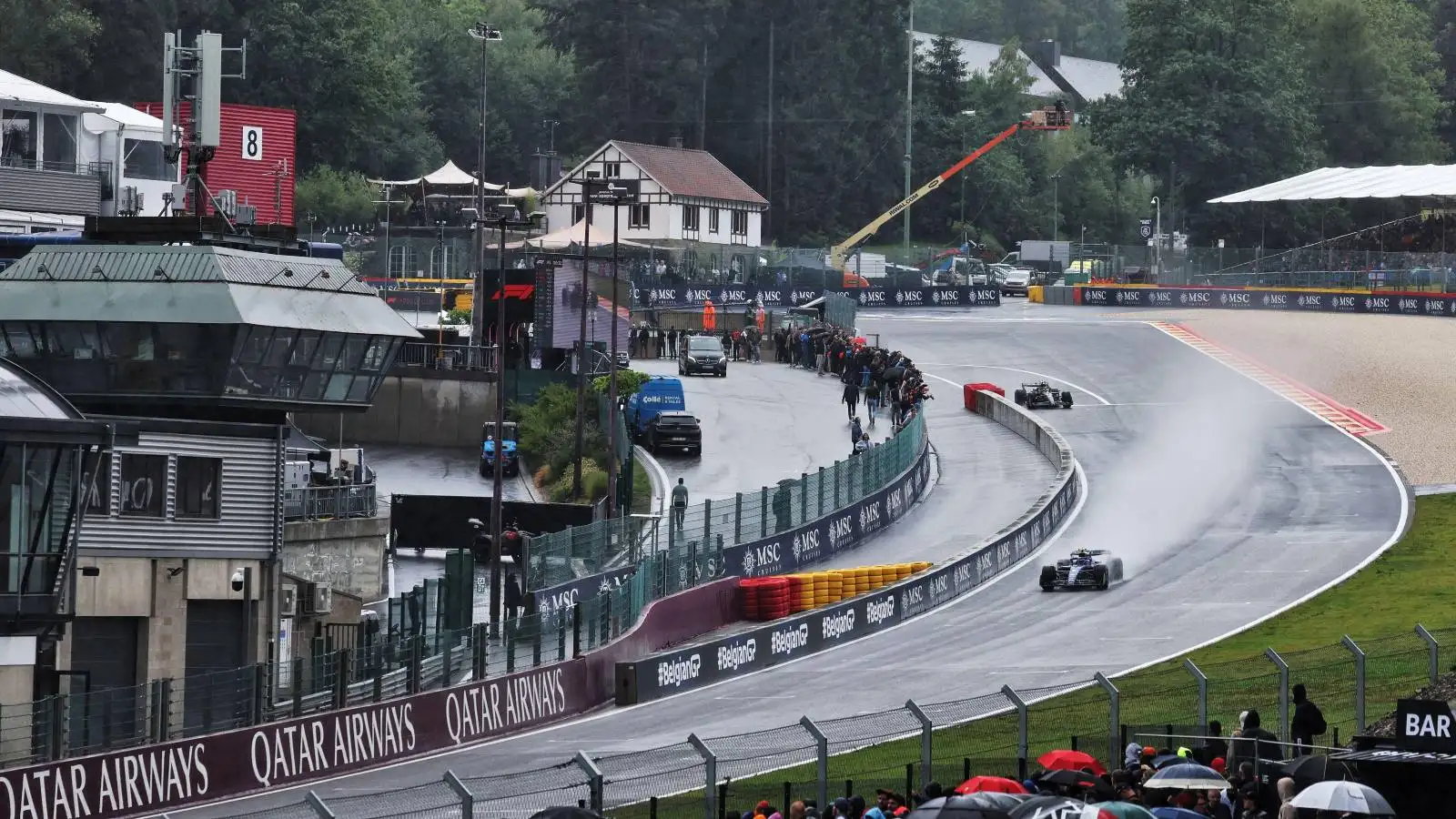 F1 cars on damp Spa-Francorchamps track. Belgium, July 2023.