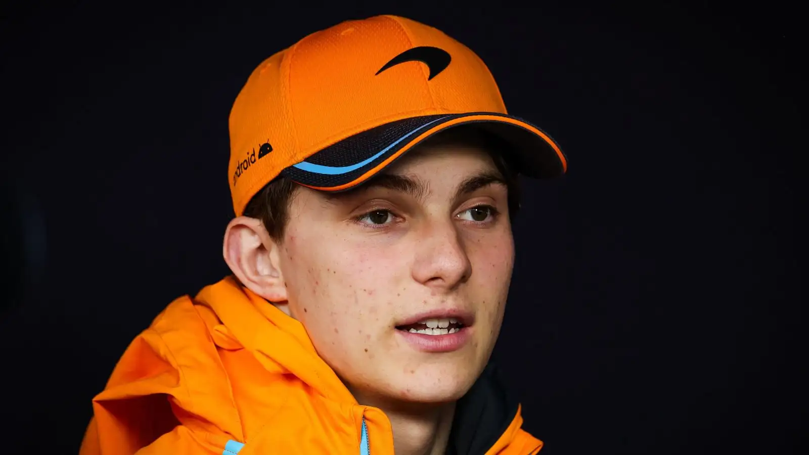 McLaren driver Oscar Piastri in conversation at the Belgian Grand Prix. Spa, July 2023.