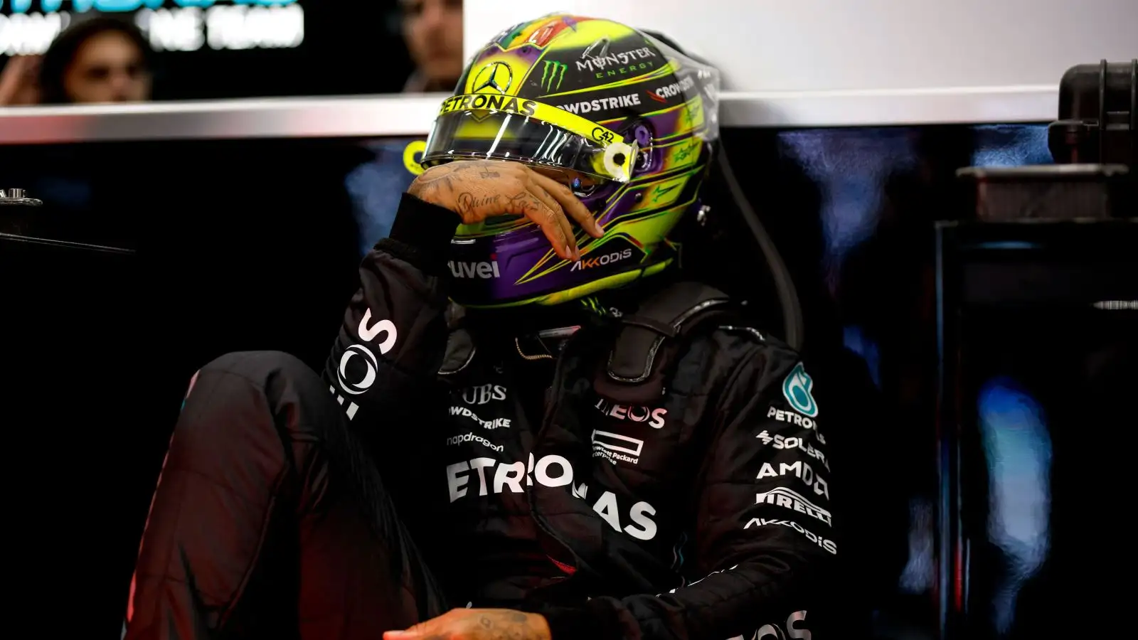 Lewis Hamilton takes a moment in the Mercedes garage at the Belgian Grand Prix. Spa, July 2023.