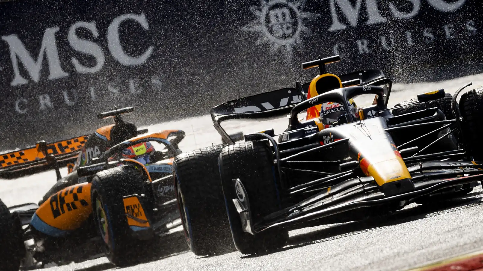 Red Bull's Max Verstappen races McLaren's Oscar Piastri at the 2023 Belgian Grand Prix.