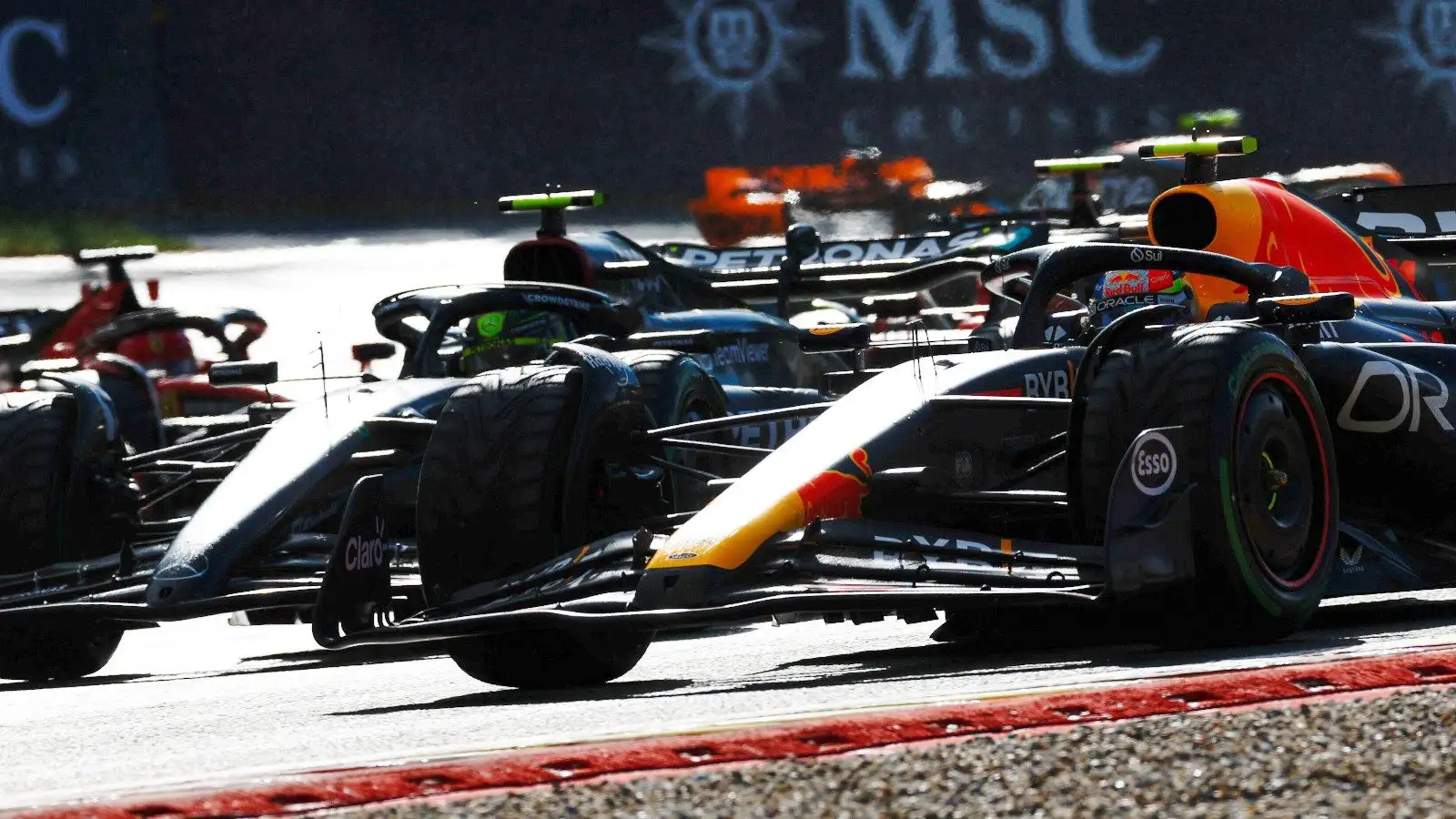 Lewis Hamilton got his Mercedes alongside the Red Bull of Sergio Perez. Belgium July 2023. F1 News