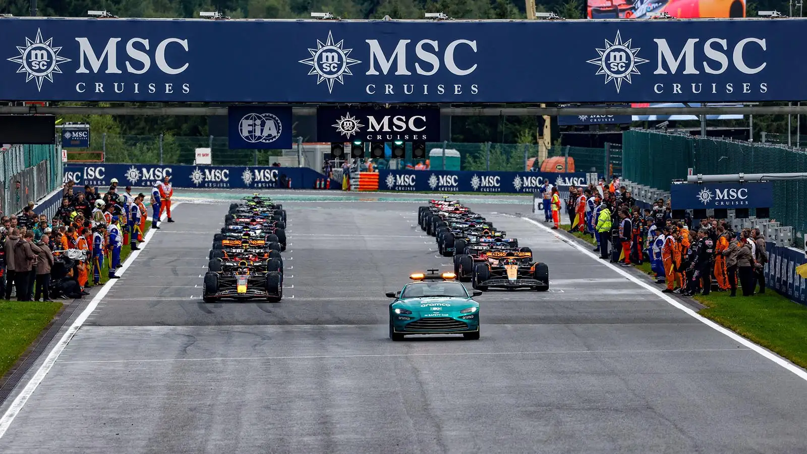All 20 F1 drivers line up behind the Safety Car for the Belgian Grand Prix sprint race.