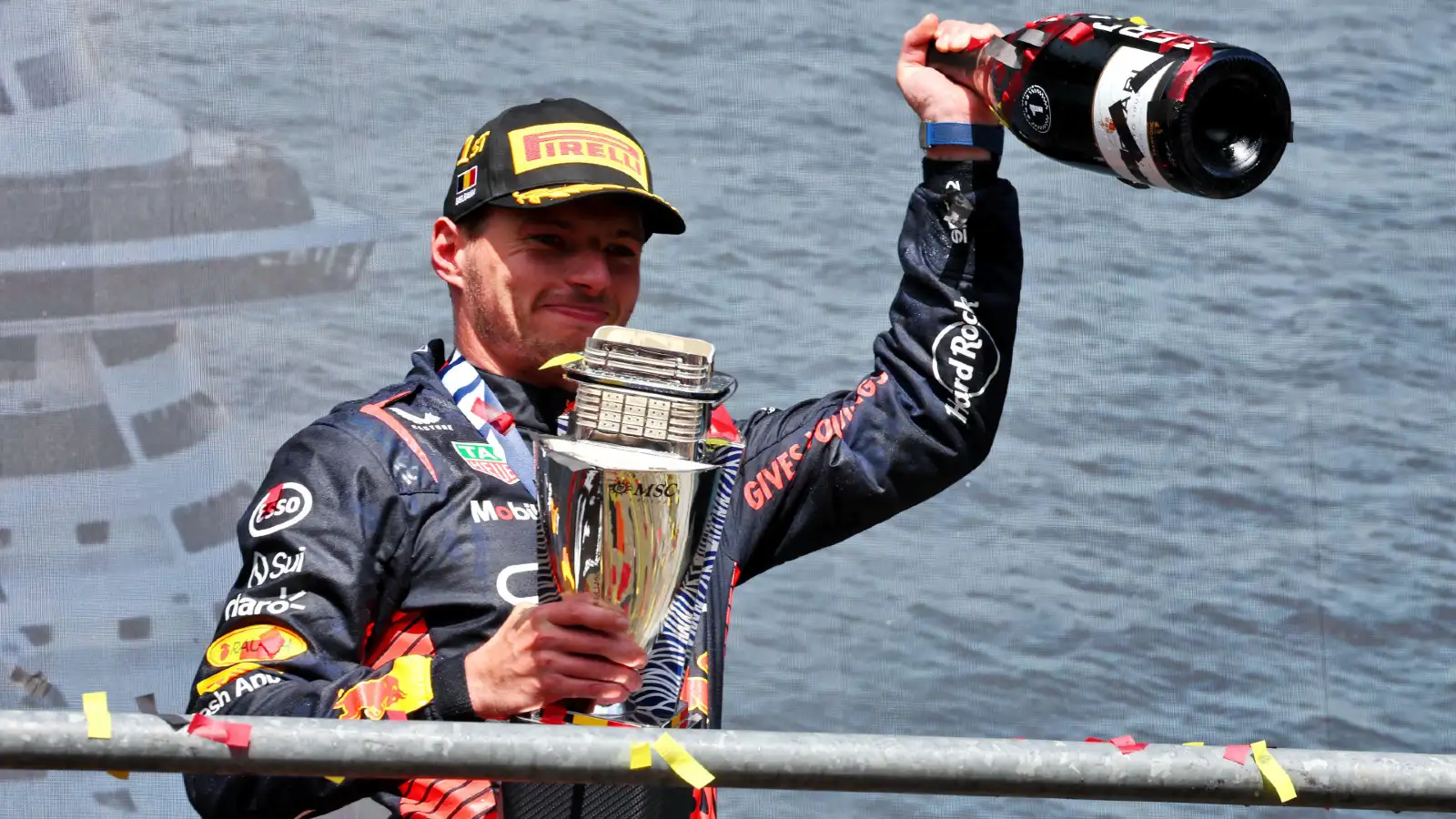 Max Verstappen, Red Bull, holds winner's trophy. Belgium, July 2023.