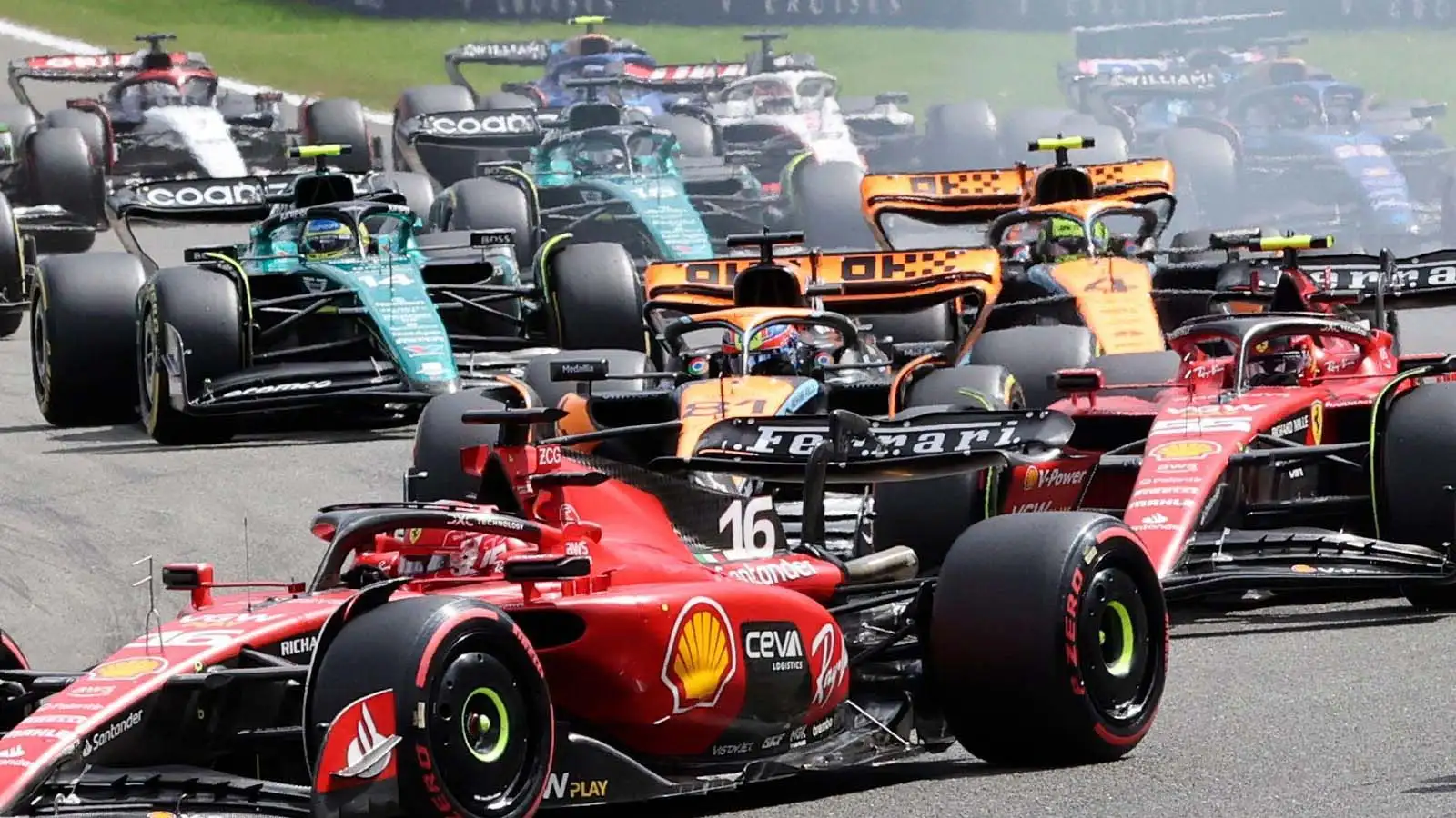 McLaren driver Oscar Piastri is pinched at La Source. Belgium July 2023. F1 News