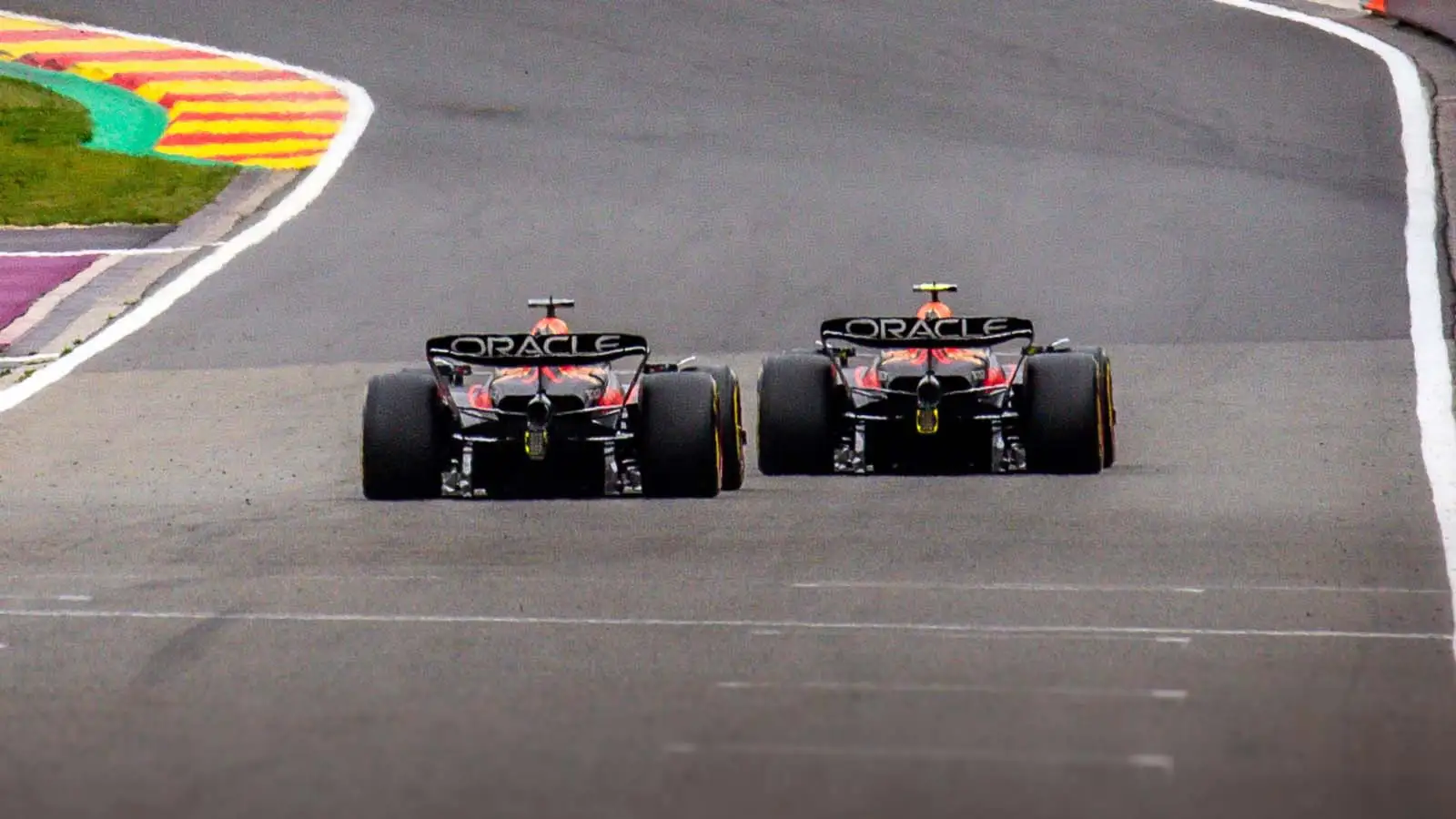 The Red Bull duo plunge down towards Eau Rouge at Spa.