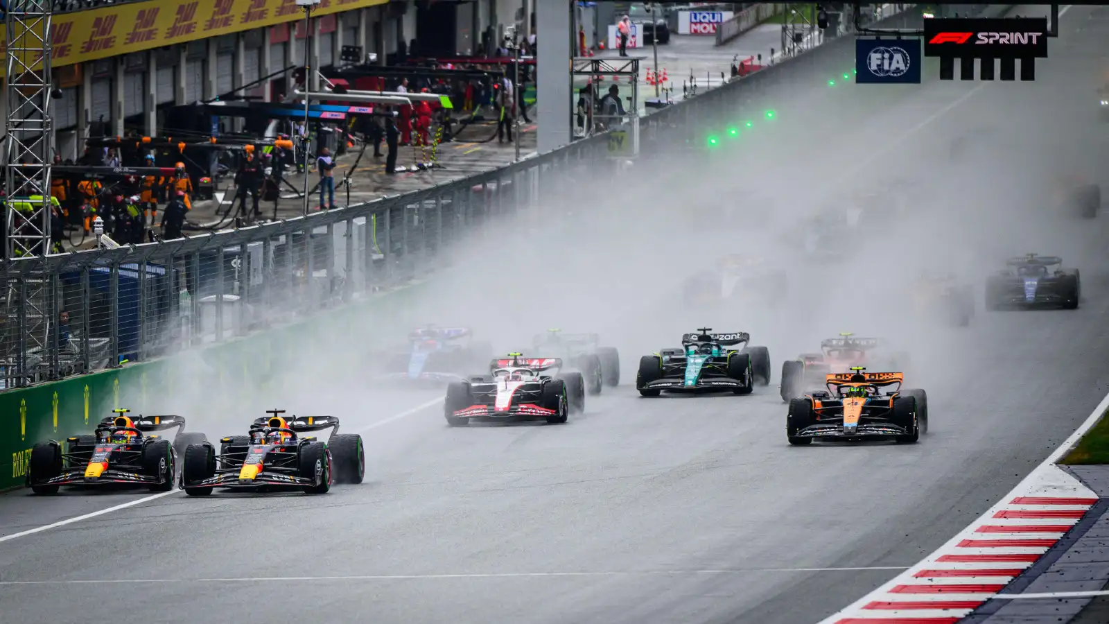 Austrian Grand Prix: Max Verstappen and Sergio Perez battle at the start of the Sprint race.