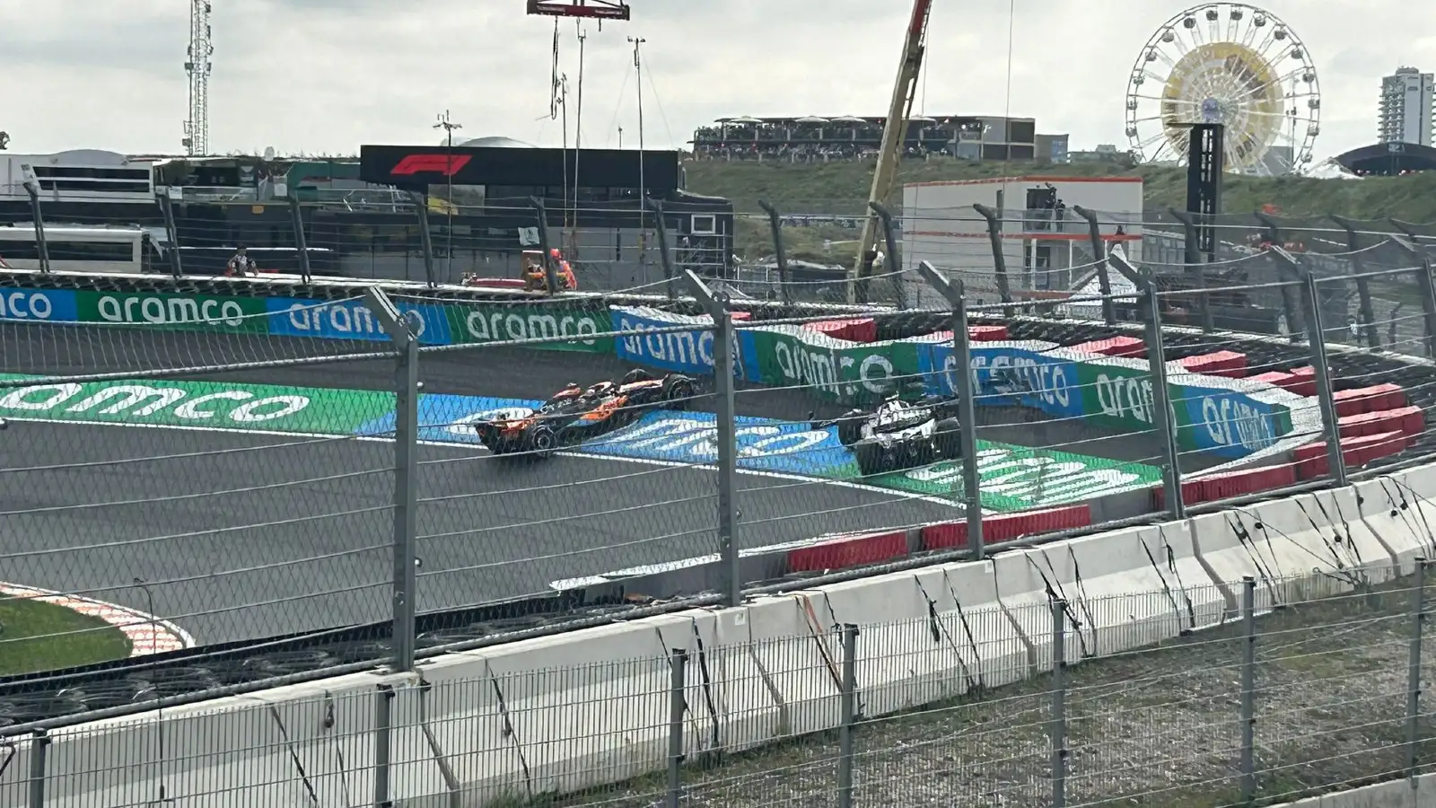 The crashed cars of Oscar Piastri and Daniel Ricciardo at Zandvoort in FP1.