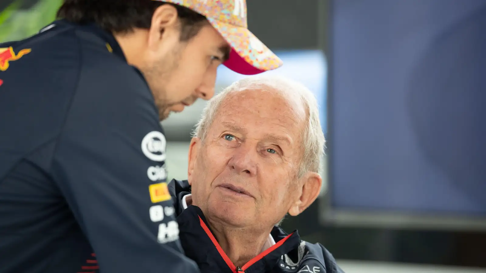 Helmut Marko in conversation with Red Bull F1 driver Sergio Perez at the Dutch Grand Prix.