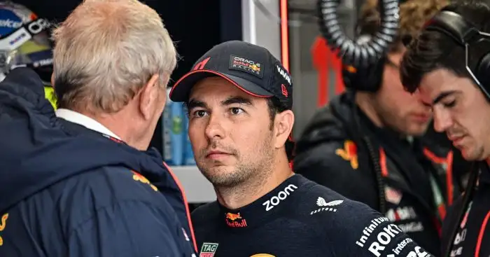 Red Bull's Helmut Marko speaking with Sergio Perez