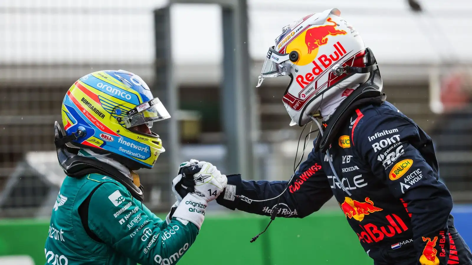 Aston Martin driver Fernando Alonso congratulates Max Verstappen after the Red Bull star's record-equalling Dutch Grand Prix win.