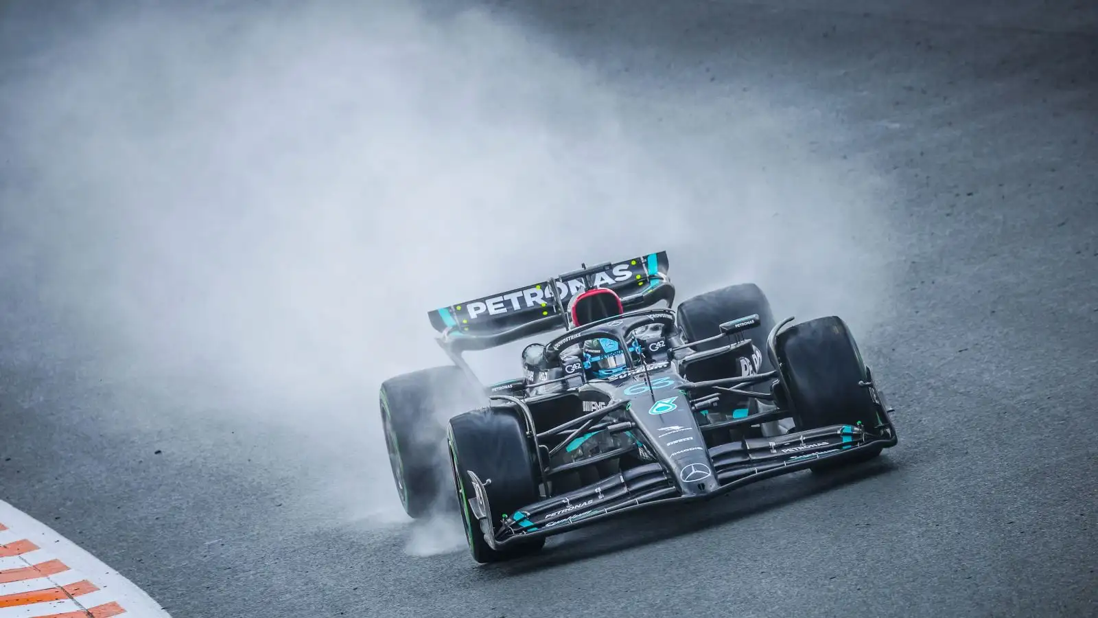 Mercedes driver George Russell tackles a wet track in the Dutch Grand Prix at Zandvoort.