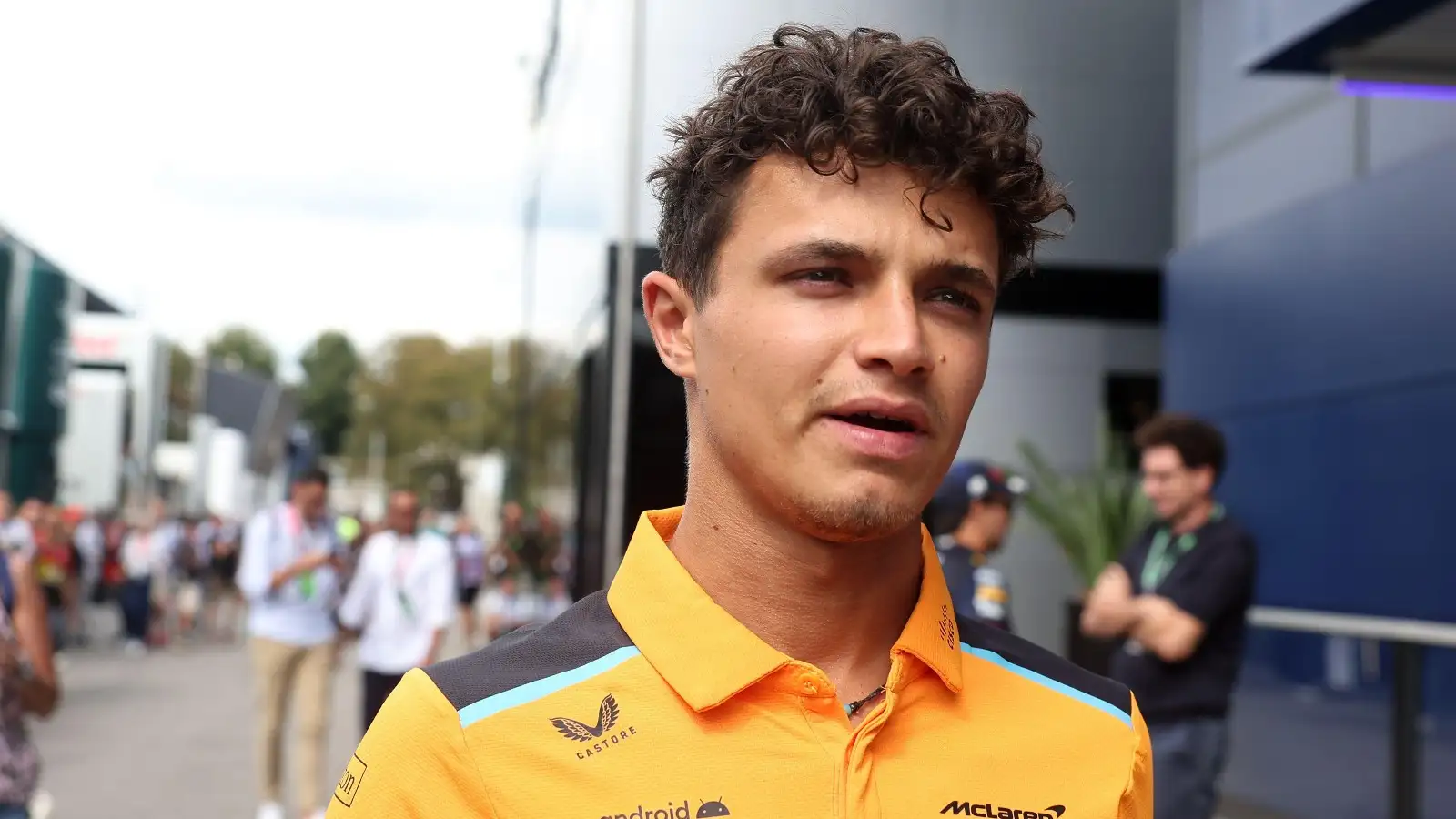 拉ndo Norris, McLaren, in the paddock in Italy.