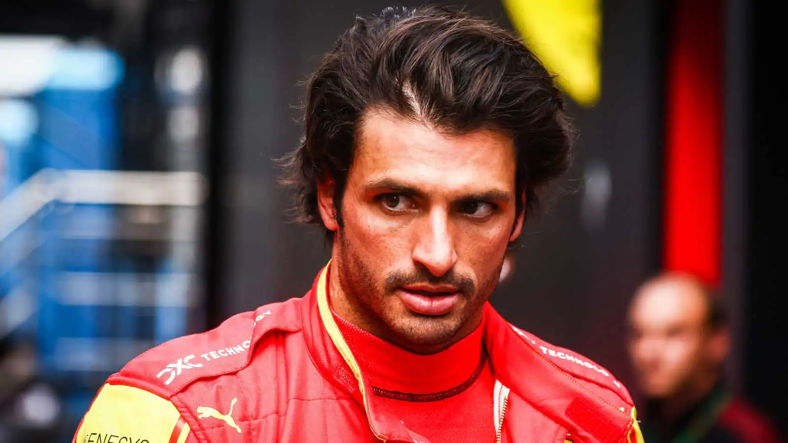 Ferrari driver Carlos Sainz in overalls.