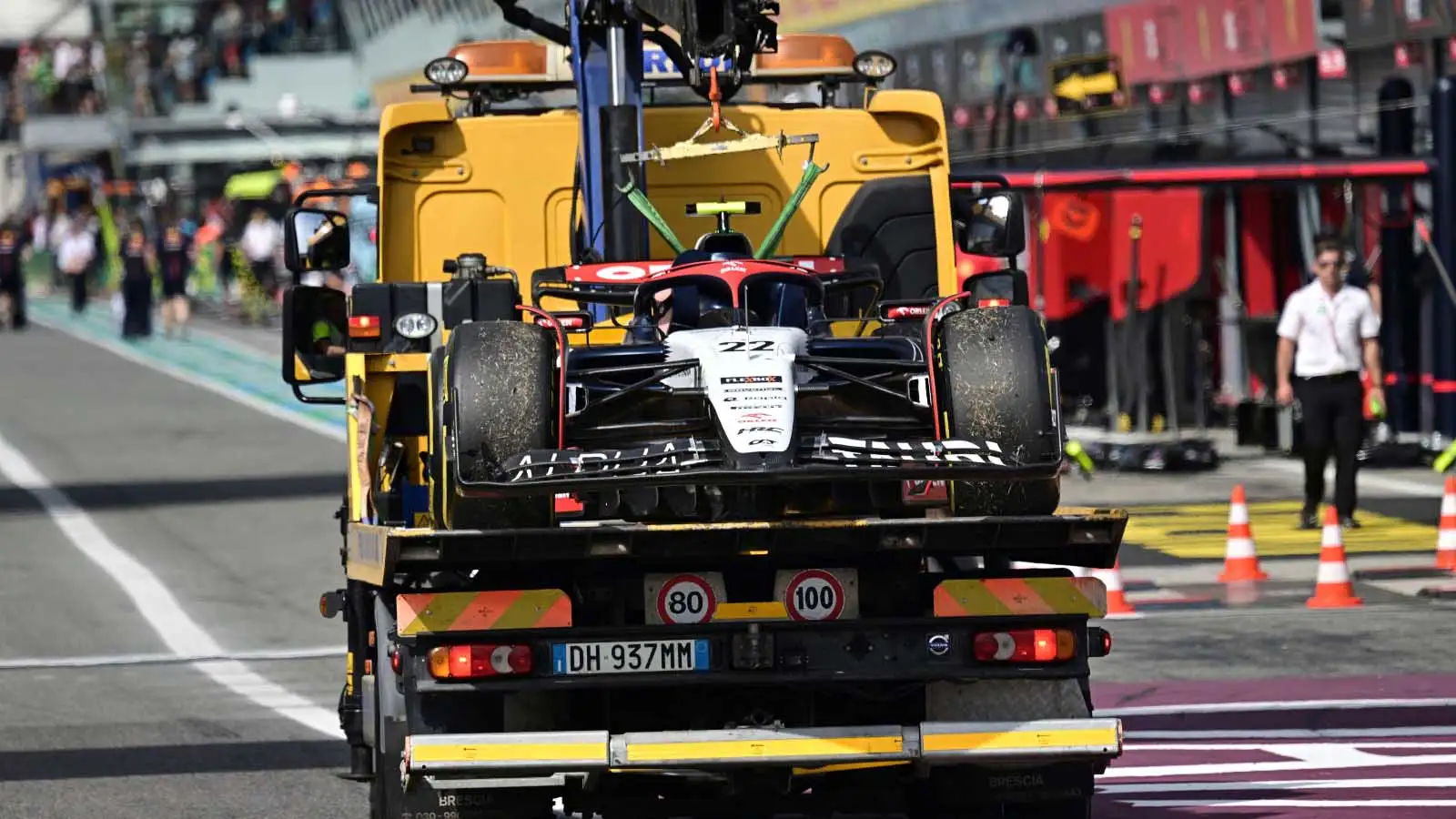 The AlphaTauri of Yuki Tsunoda on the back of a truck at the Italian Grand Prix.