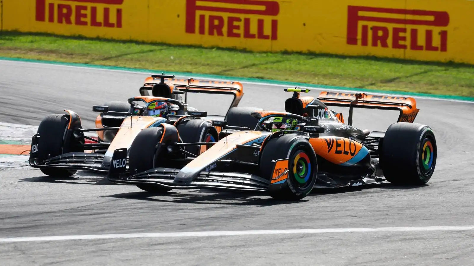 McLaren team-mates Lando Norris and Oscar Piastri close. Italy, September 2023.