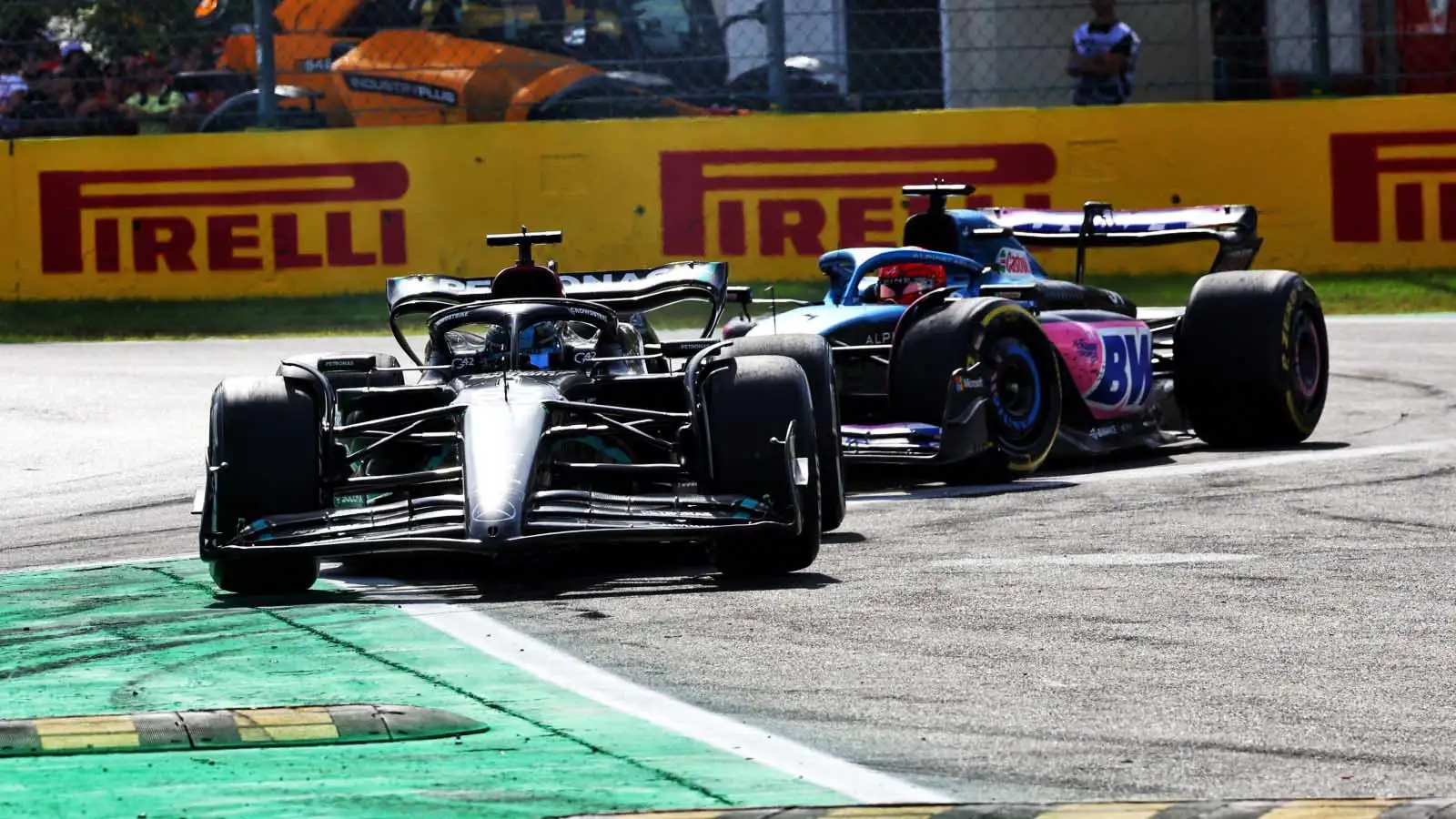 George Russell and Esteban Ocon almost tangle at Monza.