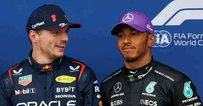 Red Bull's Max Verstappen laughs as Mercedes rival Lewis Hamilton looks on after qualifying for the 2023 Australian Grand Prix.