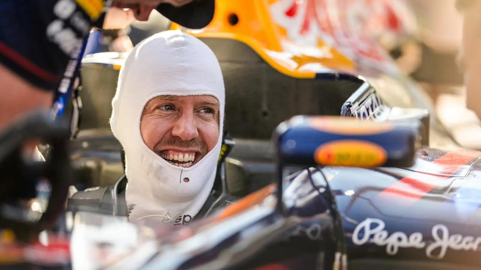 Sebastian Vettel in the Red Bull RB7 cockpit.