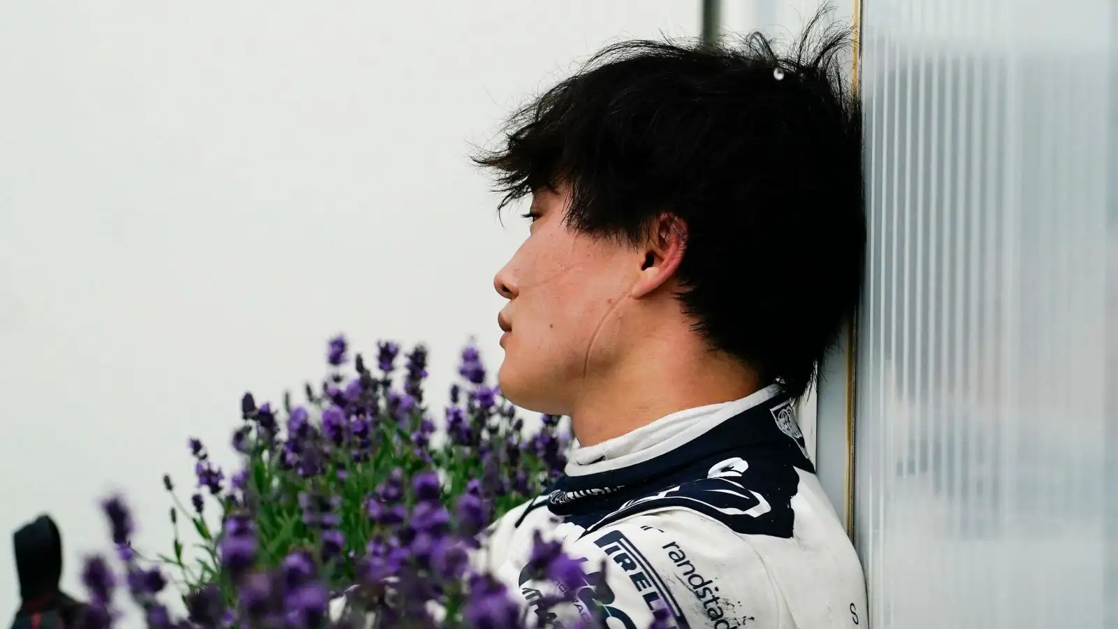 AlphaTauri driver Yuki Tsunoda in a moment of contemplation after the 2023 Spanish Grand Prix.