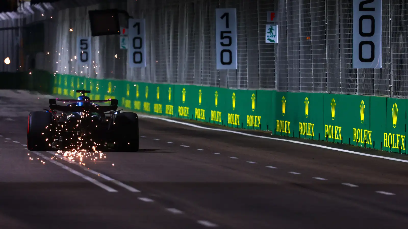 Alpine's Esteban Ocon under the lights at the Singapore Grand Prix.