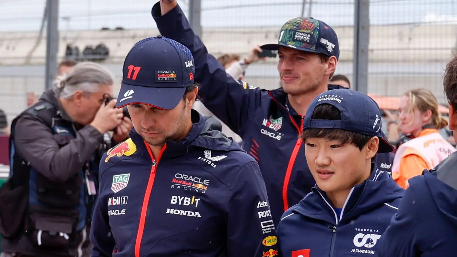 Sergio Perez, Max Verstappen and Yuki Tsunoda together. Singapore, September 2023.