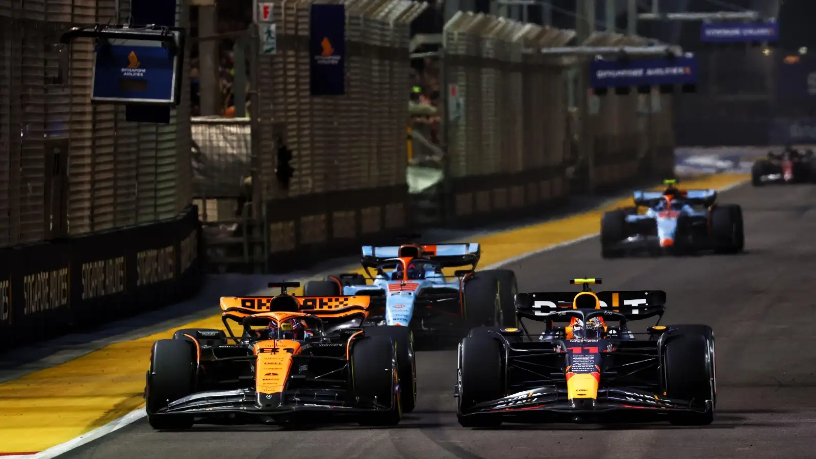 The McLaren of Oscar Piastri and the Red Bull of Sergio Perez.