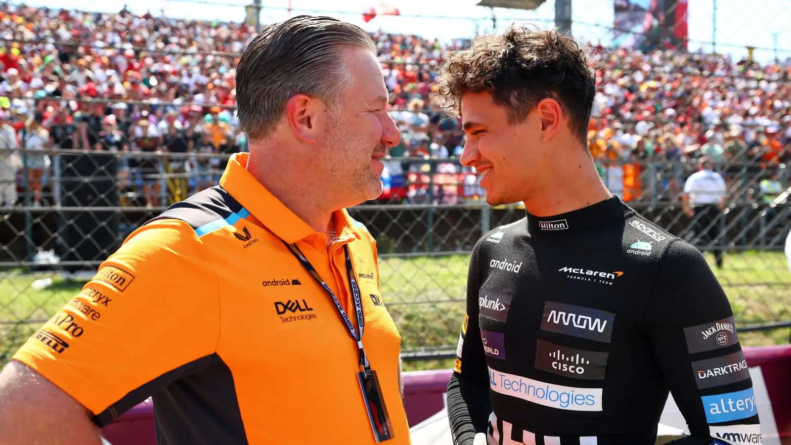 Lando Norris speaks to Zak Brown on the grid in Hungary.