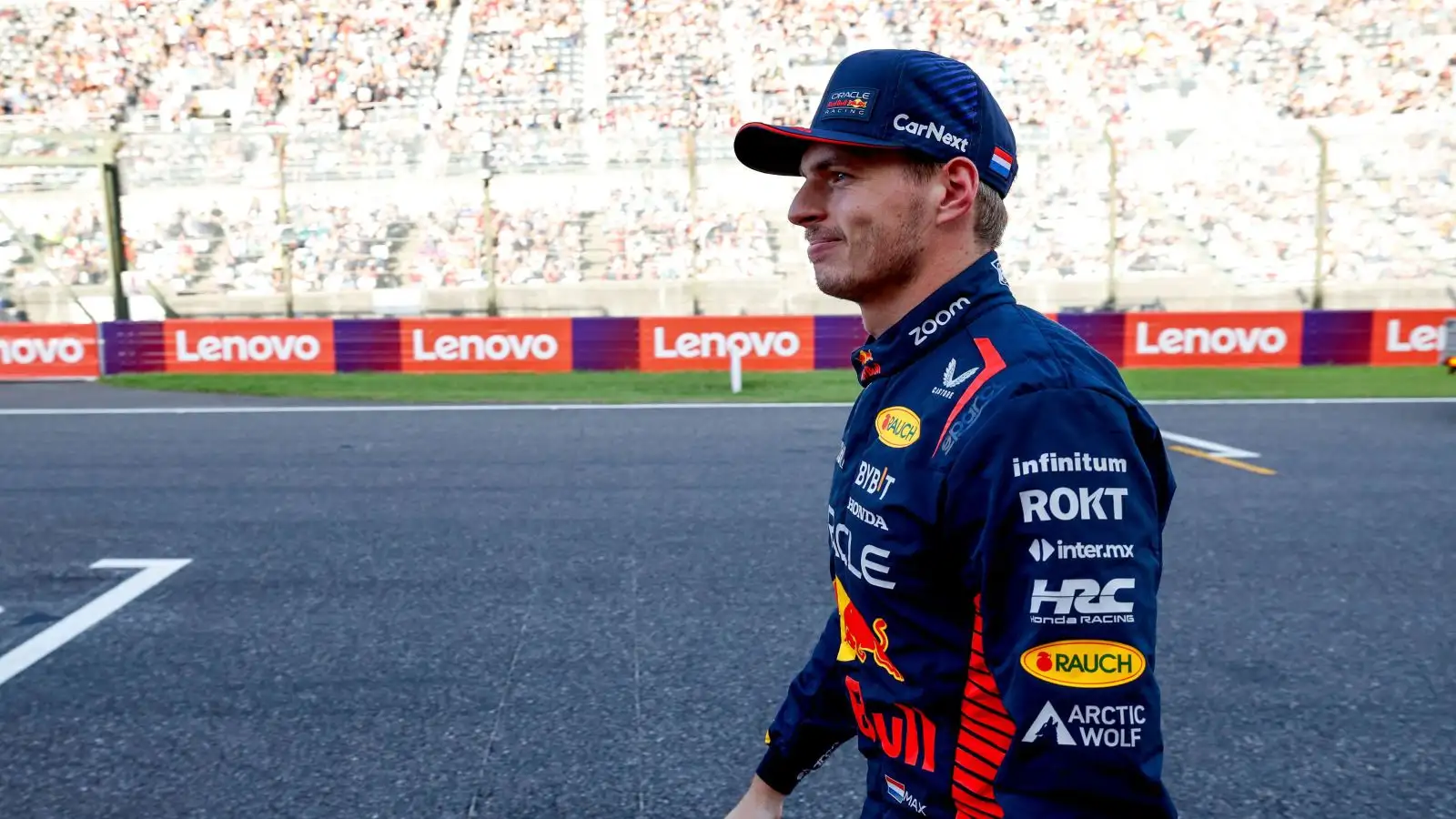 Max Verstappen takes the applause after setting pole position for the 2023 Japanese Grand Prix.