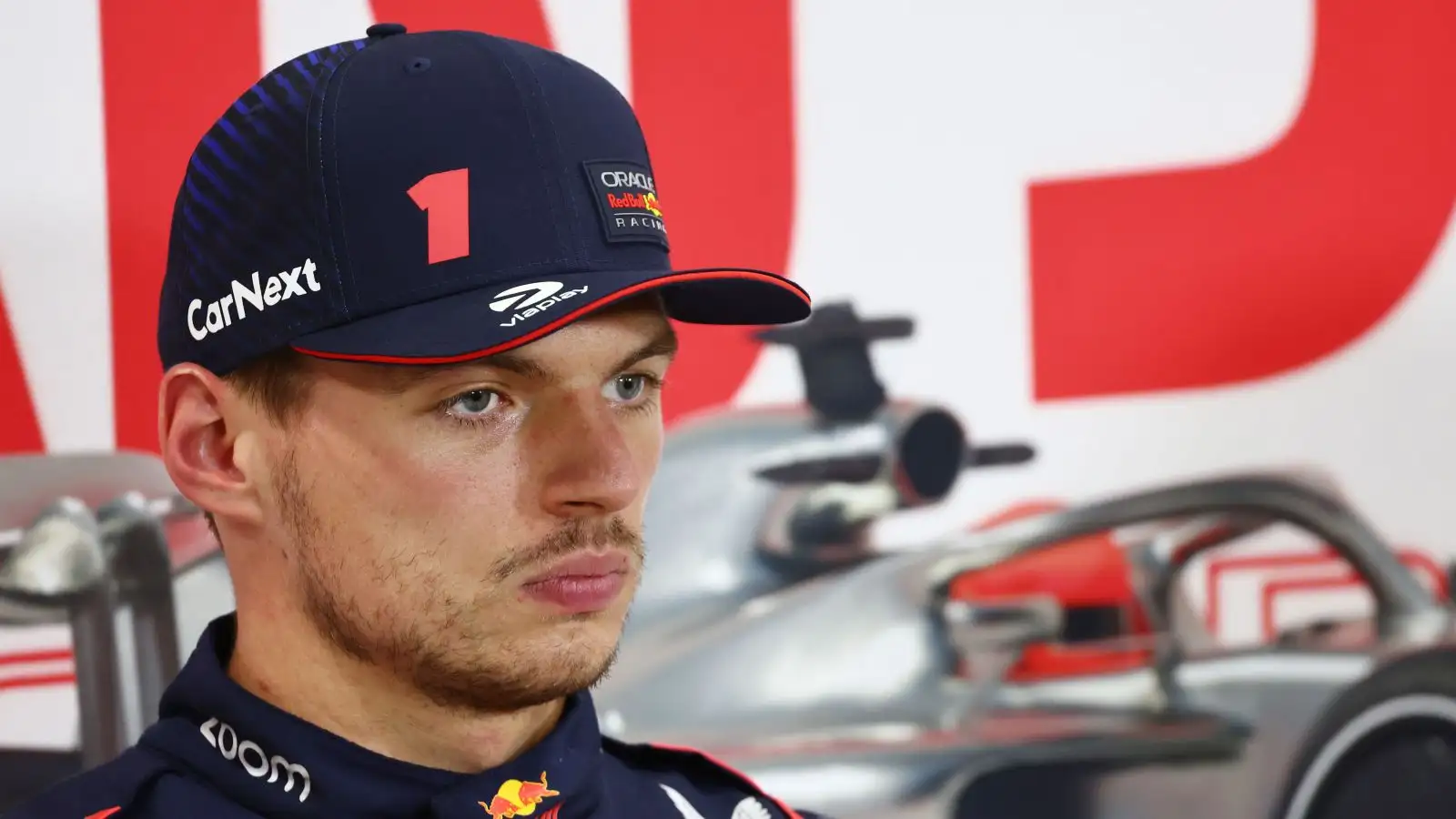 Max Verstappen faces the media after setting pole position for the 2023 Japanese Grand Prix.