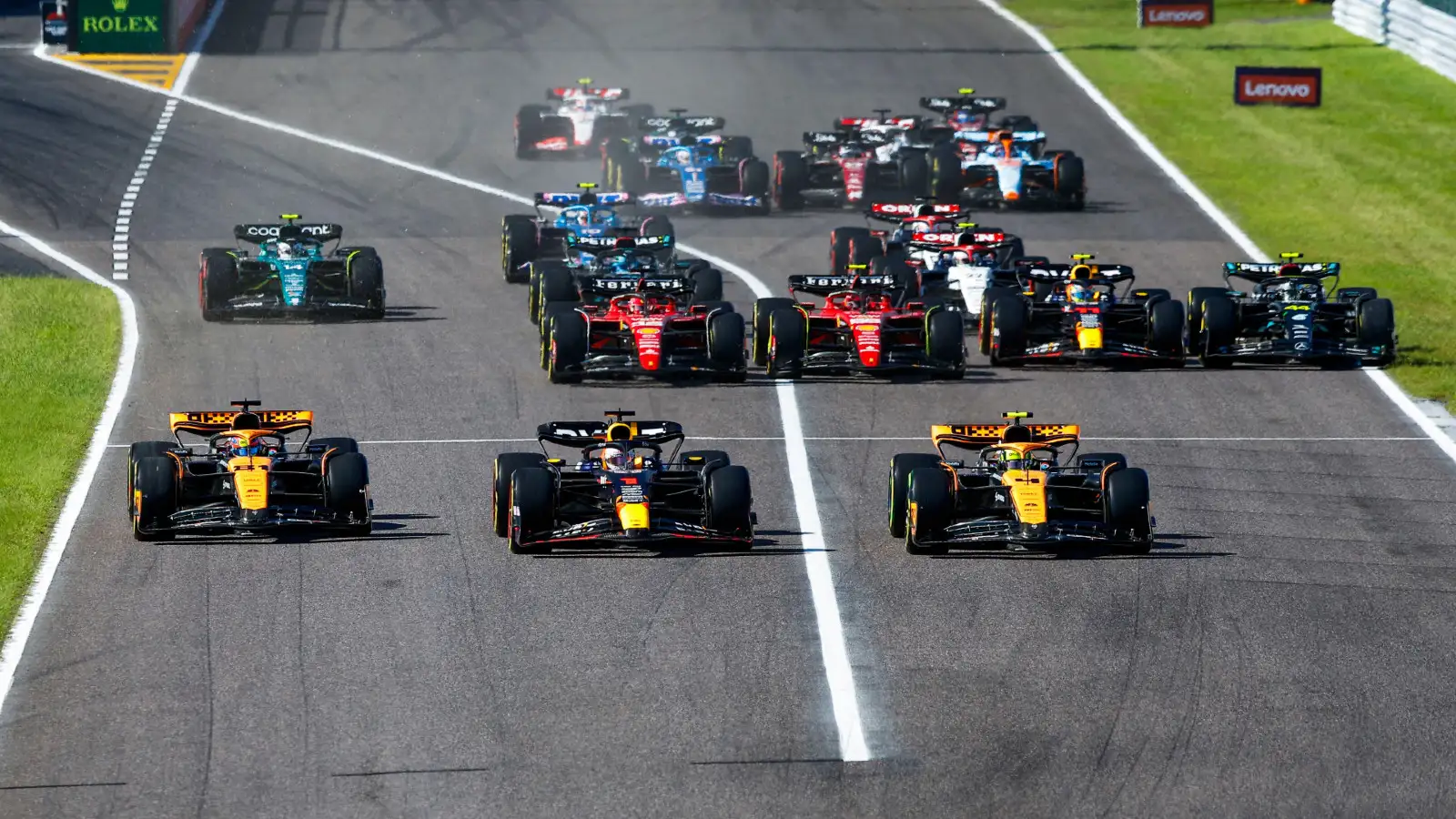 Red Bull's Max Verstappen holds onto the lead at the start of the Japanese Grand Prix.