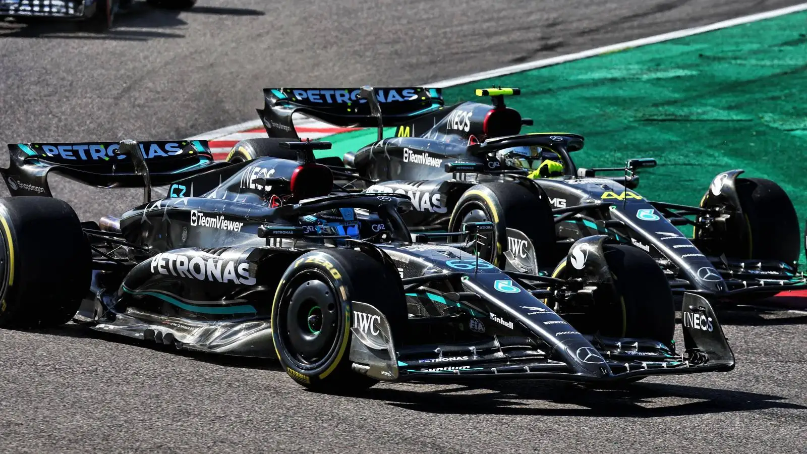 George Russell and Lewis Hamilton, Mercedes, battle. Japan, September 2023.