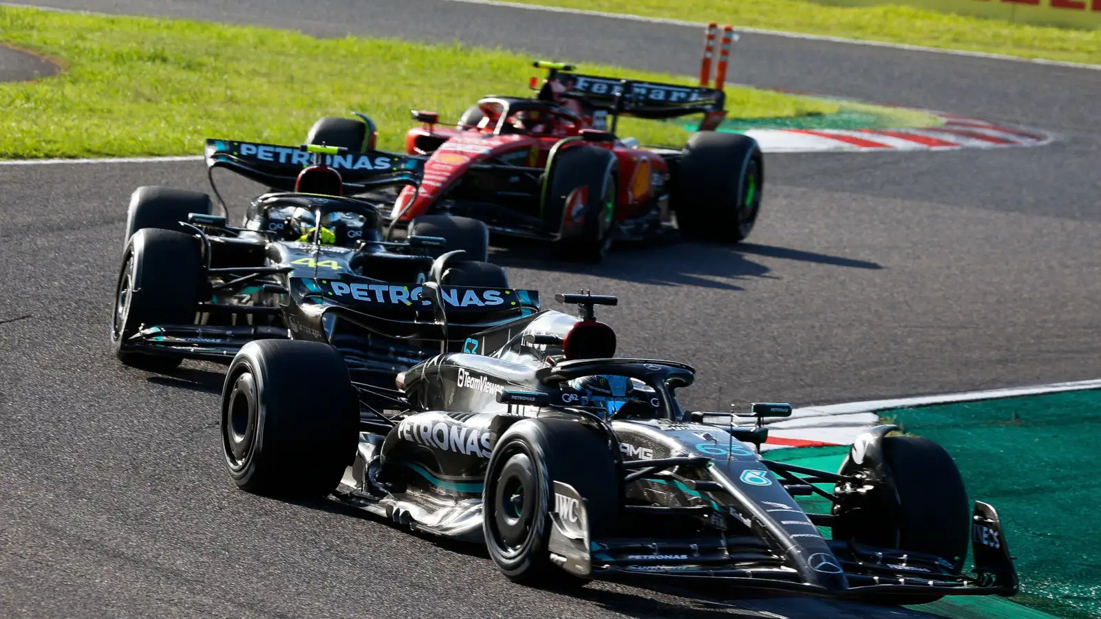 Mercedes driver George Russell leads Lewis Hamilton and Carlos Sainz late in the Japanese Grand Prix.
