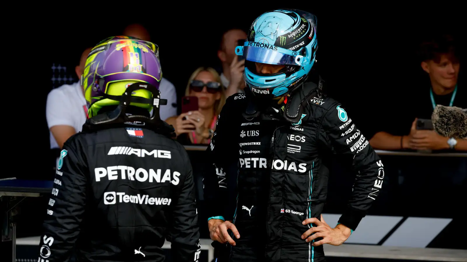 Mercedes' Lewis Hamilton and George Russell in the paddock at the British Grand Prix.