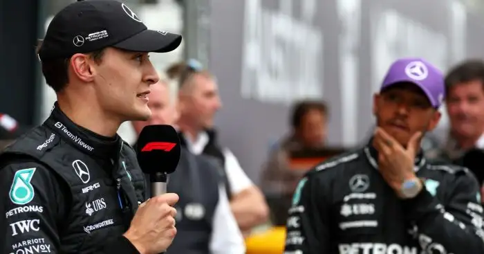 Lewis Hamilton watches on as Mercedes team-mate George Russell speaks to the media after 2023 Australian Grand Prix qualifying.