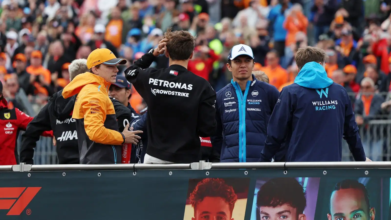 Oscar Piastri, George Russell, Alex Albon and Logan Sargeant on the driver parade bus at the Dutch GP.