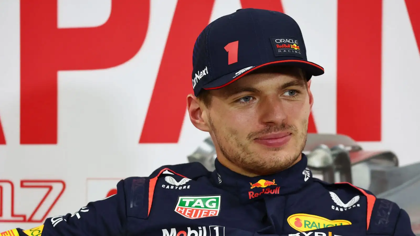 Max Verstappen (Red Bull) smiles during the press conference at the 2023 Japanese Grand Prix.