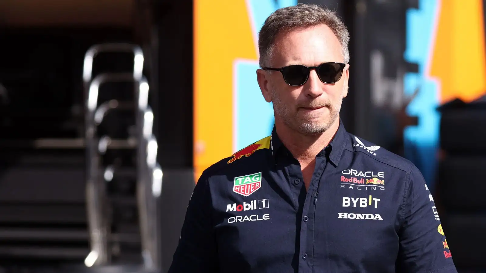 Red Bull boss Christian Horner, wearing sunglasses, in the paddock at the Italian Grand Prix.