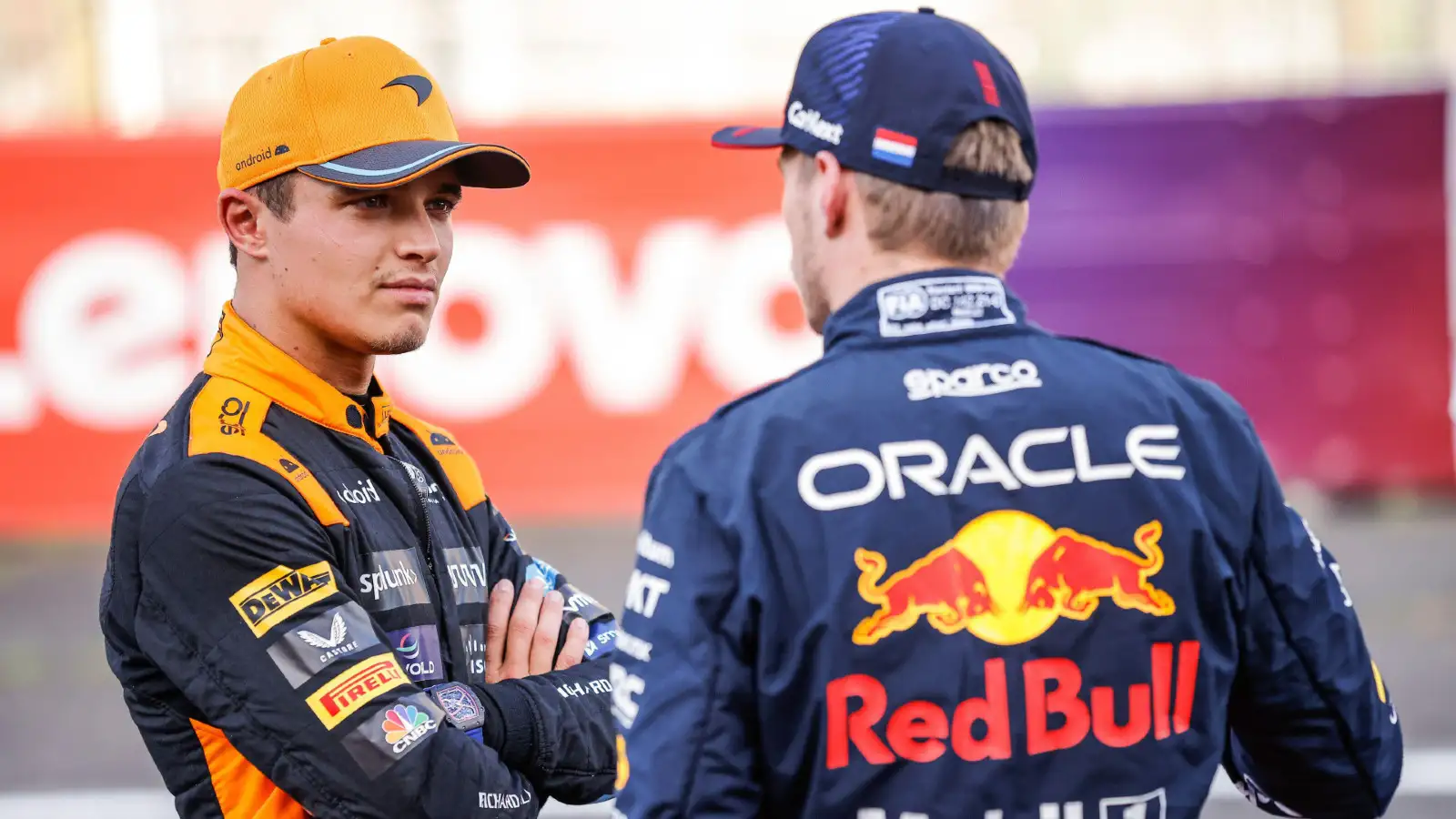 McLaren's Lando Norris chats with Red Bull's Max Verstappen at the Japanese Grand Prix.